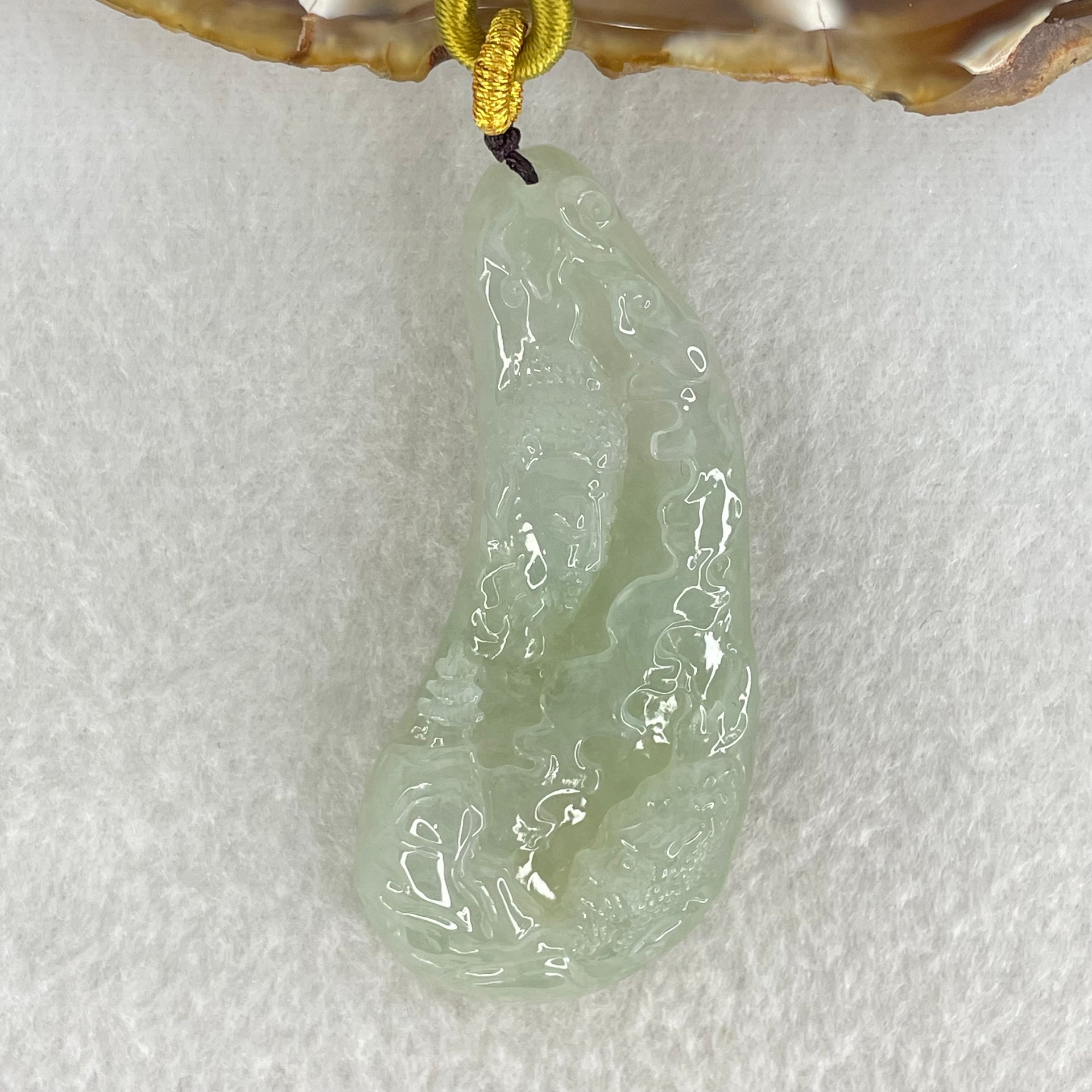 Type A Jelly Light Green Jadeite Buddha and Good Vs Evil Pendant 31.00g 61.2 by 27.0 by 11.4mm - Huangs Jadeite and Jewelry Pte Ltd