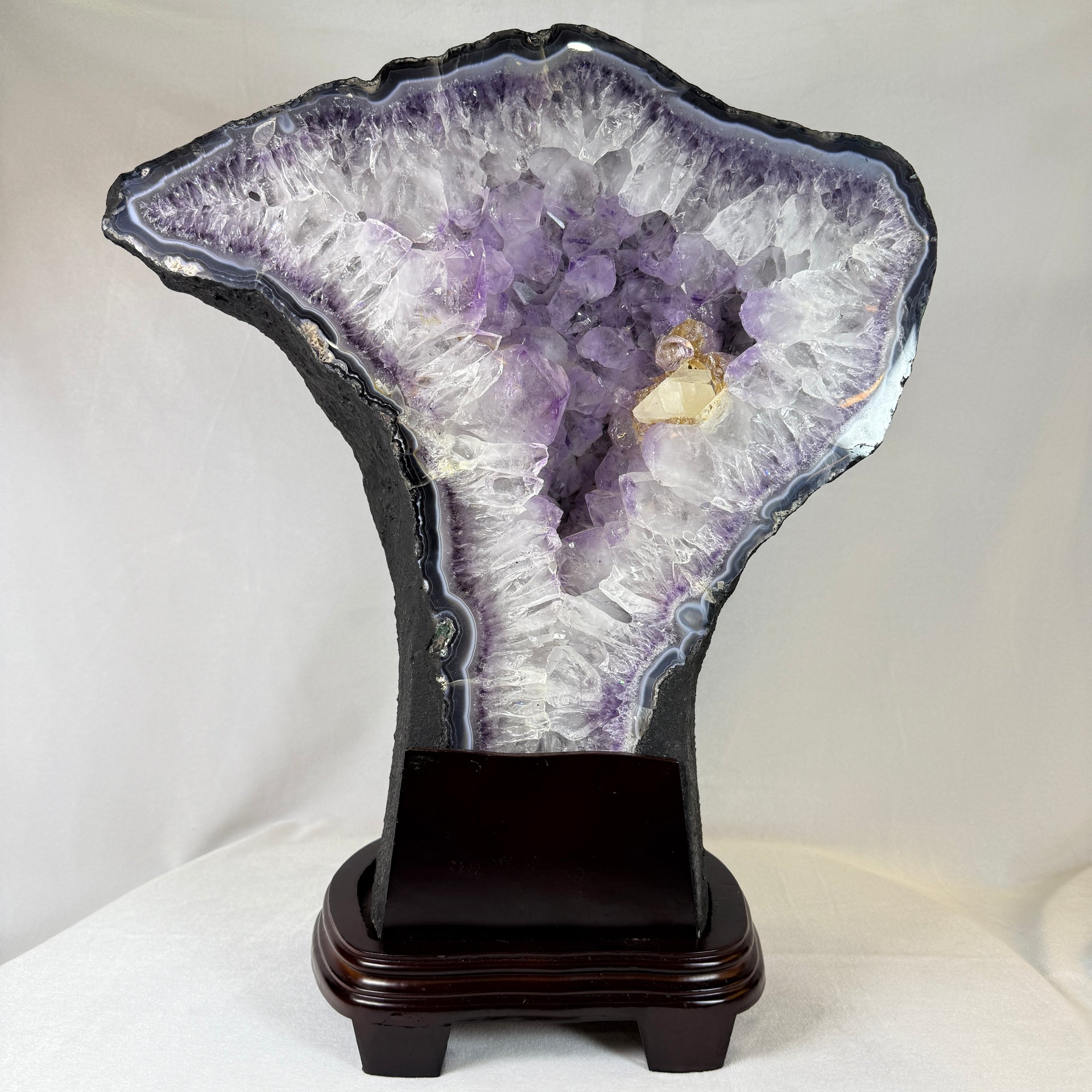 Natural Tree Shape Amethyst Cave with Wooden Stand Display 27,441.2g 410 by 235.0 by 505.0mm - Huangs Jadeite and Jewelry Pte Ltd