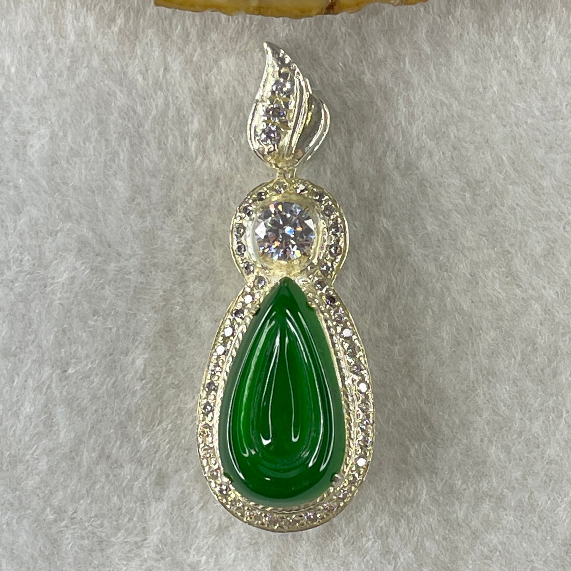 Type A Natural Semi Icy Bright Green Jadeite Tear Drop Shape Stone for Setting 18.1 by 10.5 by 3.0mm (On Silver Pendant Mold) 15.22g - Huangs Jadeite and Jewelry Pte Ltd