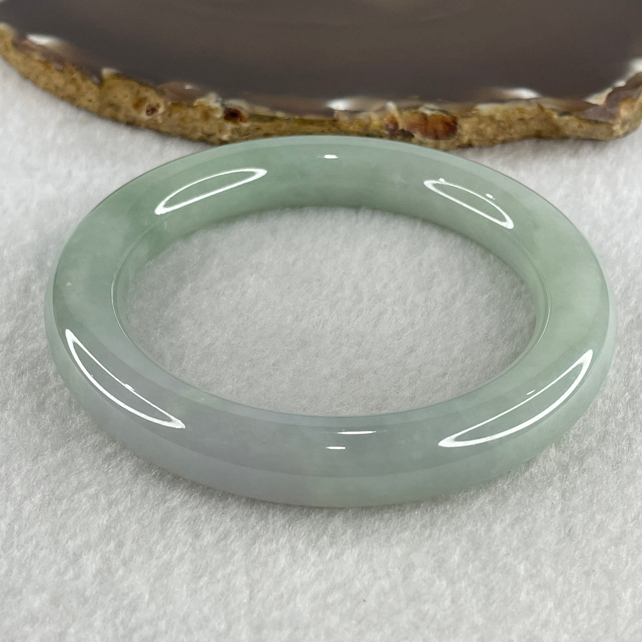 Type A Natural Jelly Light Green with Faint Lavender Jadeite Bangle 74.36g Inner Diameter 59.2mm 11.3 by 11.9mm (Close to Perfect) - Huangs Jadeite and Jewelry Pte Ltd