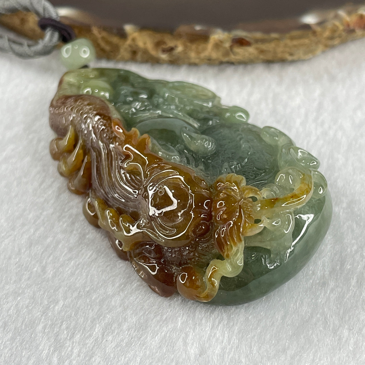 Grand Master Type A Light Green with Yellow Patches Jadeite Dragon Double Side Pendant 100.73g 35.0 by 43.3 by 20.9mm