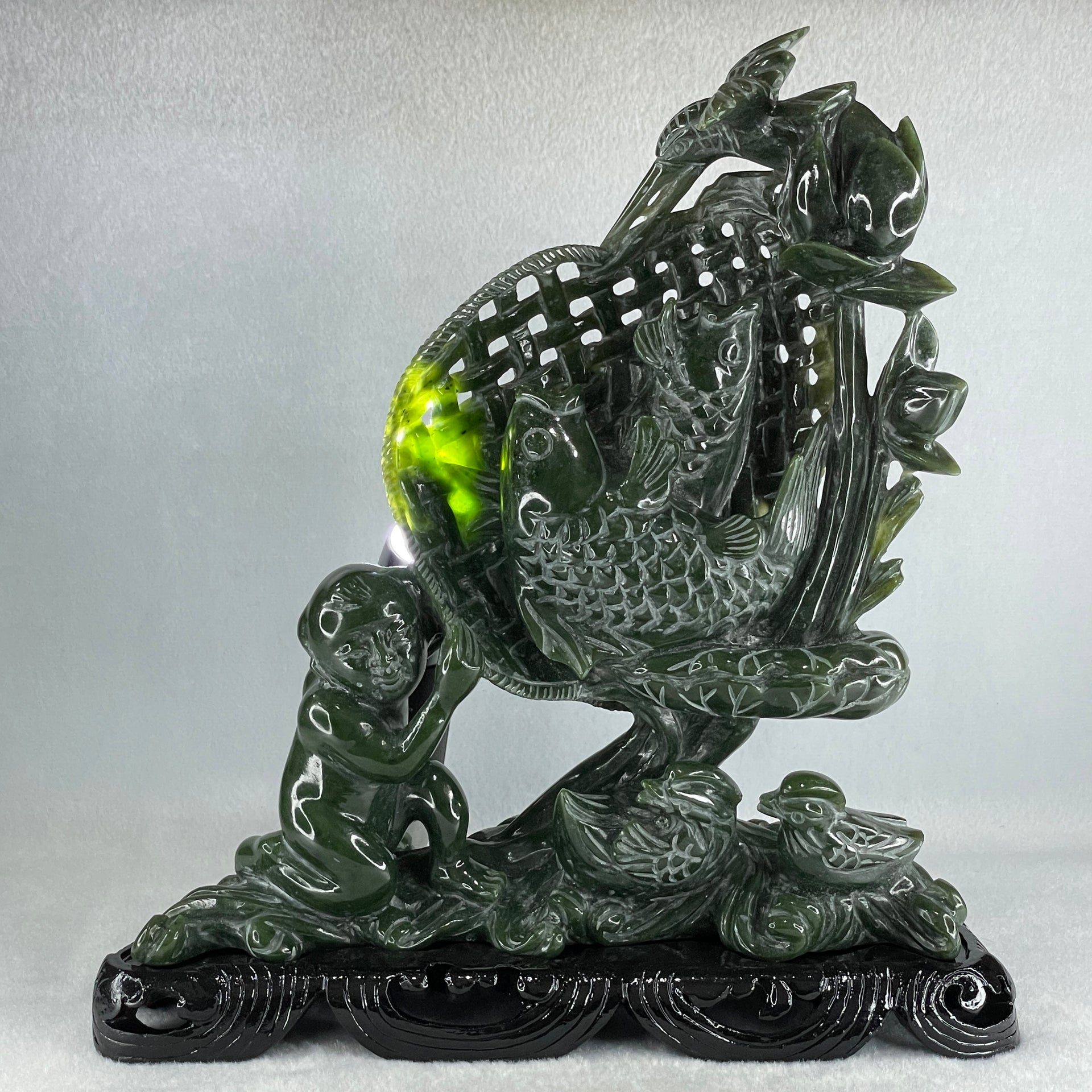 Natural Dark Green Serpentine Double Carp Fish with Gui ren and Lotus and Twin Ducks with Wooden Stand Display 2,032.7g 242.0 by 95.0 by 263.0mm - Huangs Jadeite and Jewelry Pte Ltd