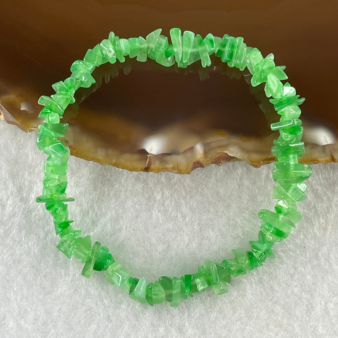 Type A Natural Semi Bright Green Jadeite Fragments Bracelet 5.53g 13cm 5.9mm About 110 pieces - Huangs Jadeite and Jewelry Pte Ltd