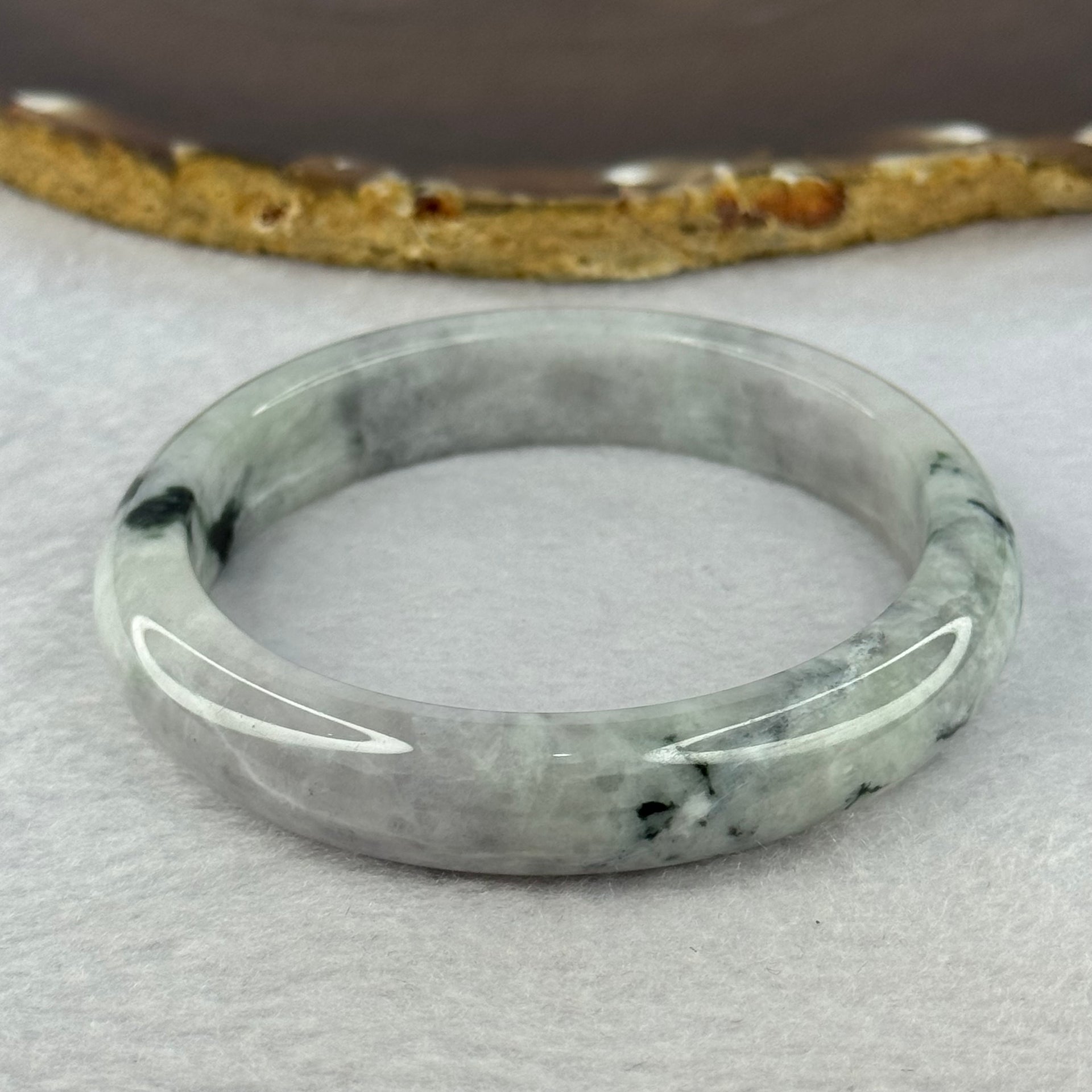 Type A Green Lavender with Dark Green Patches 50.67g Internal Diameter 57.5mm 12.6 by 8.2mm (Internal Lines) - Huangs Jadeite and Jewelry Pte Ltd