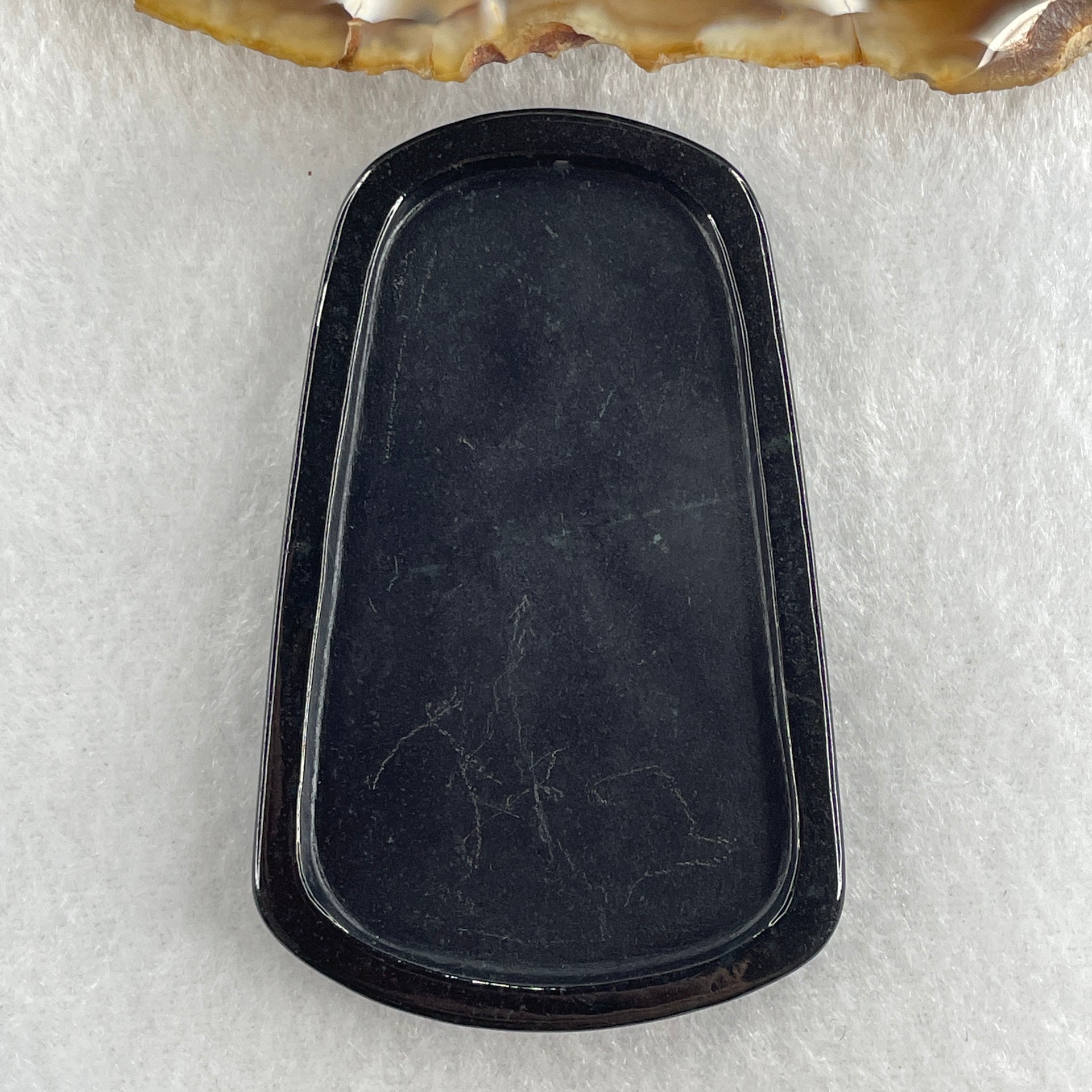 Type A Opaque to Partial Translucent Black Omphacite Jadeite Dragon Pendant 32.91g 66.0 by 42.2 by 9.5mm - Huangs Jadeite and Jewelry Pte Ltd