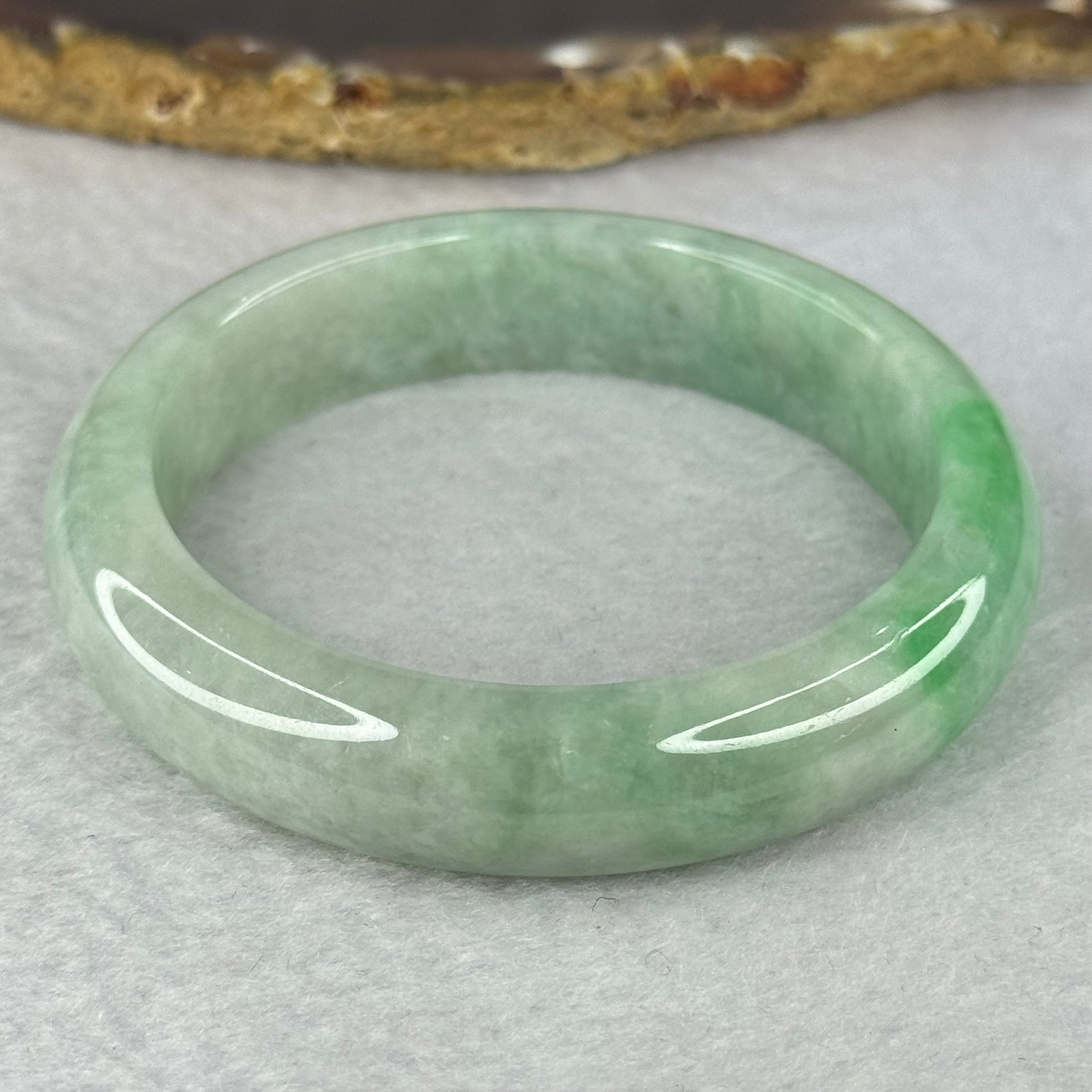 Type A Green with Apple Green Patches Jadeite Bangle 56.91g Inner Diameter 54.8mm 13.6 by 8.3mm (Slight Internal Lines) - Huangs Jadeite and Jewelry Pte Ltd