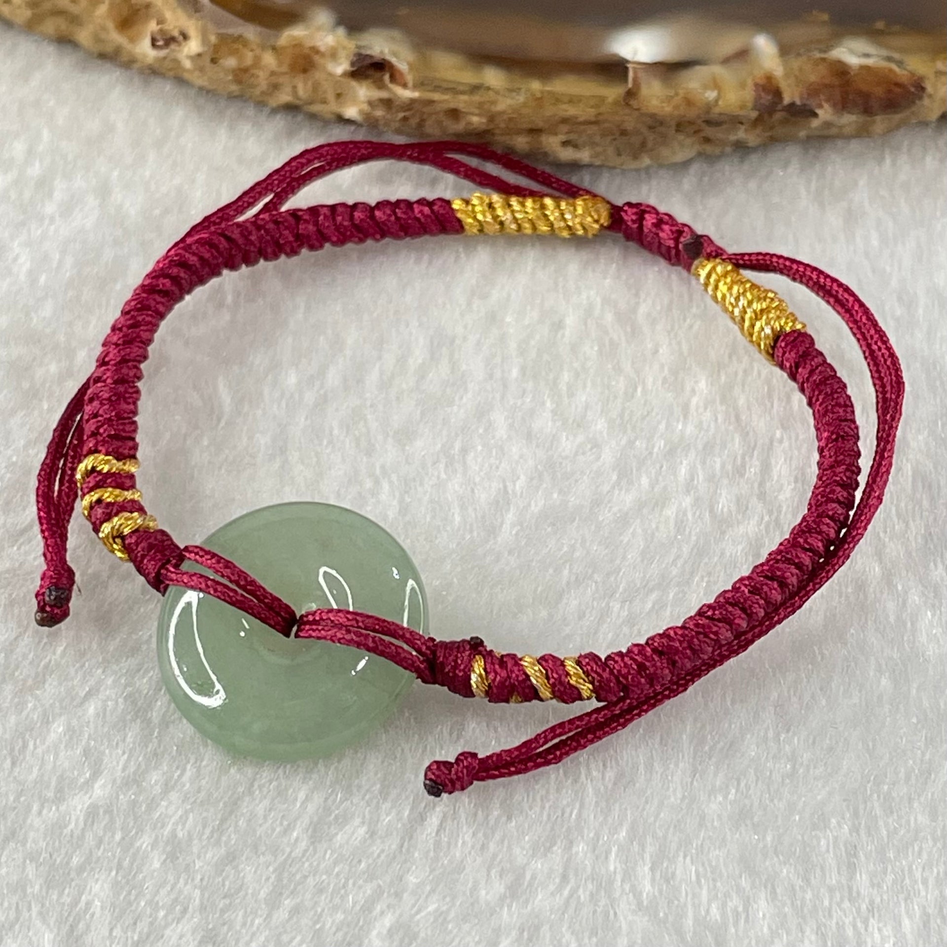 Type A Blueish Green Jadeite Ping An Kou Donut In String Bracelet 2.38g 16.4 by 4.6mm - Huangs Jadeite and Jewelry Pte Ltd