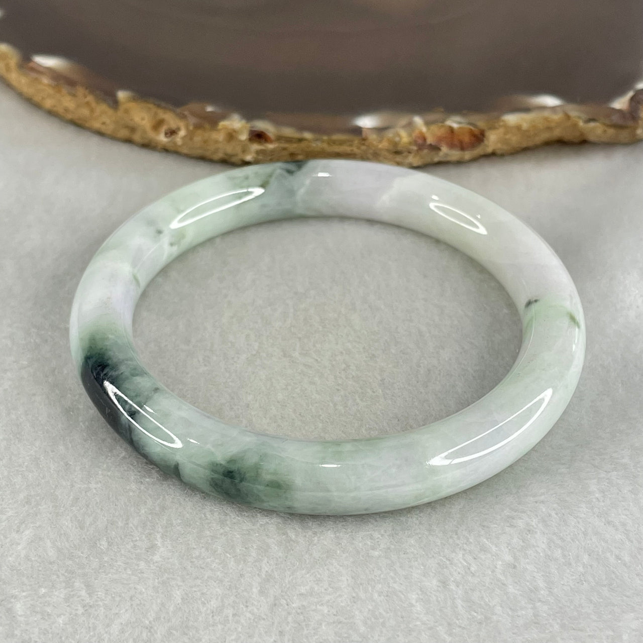 Type A Light Green with Green piao Hua Floral Jadeite Bangle 45.49g Inner Diameter 56.9mm 9.6 by 9.3mm (Internal Lines) - Huangs Jadeite and Jewelry Pte Ltd