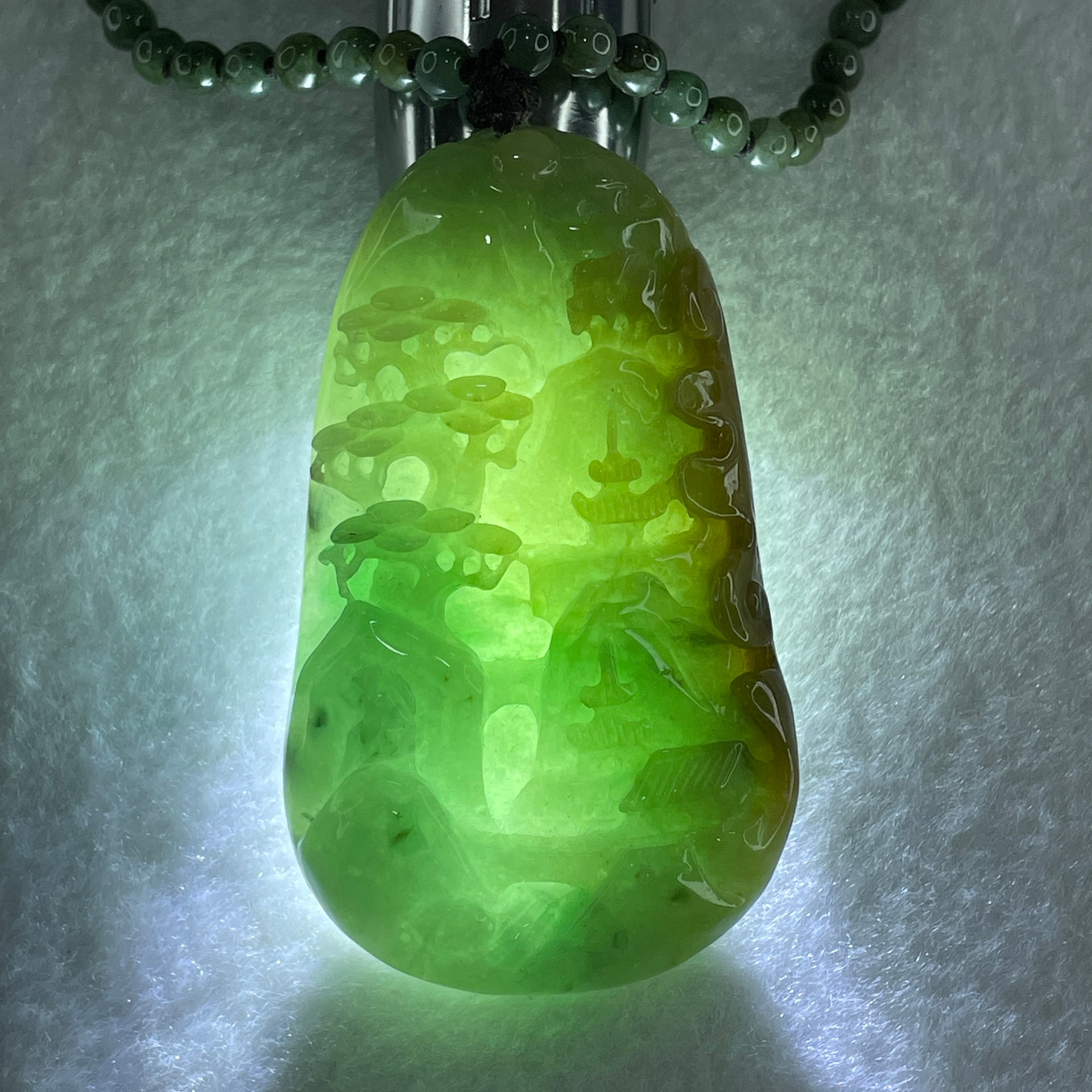 Natural Type A Green with Yellowish Jadeite Shan Shui with Gui Ren Pendant 127.68g 75.0 by 44.7 by 14.7mm - Huangs Jadeite and Jewelry Pte Ltd