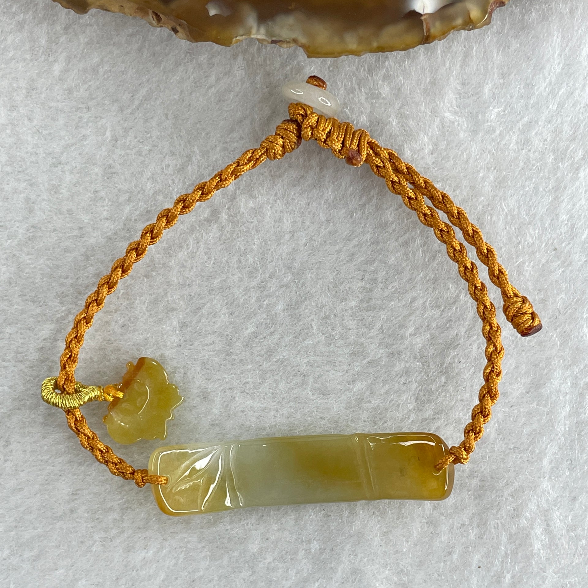 Natural Type A Yellowish with Light Green Jadeite Bamboo with Butterfly in String Bracelet 3.97g 14-16cm 39.1 by 9.1 by 2.9mm - Huangs Jadeite and Jewelry Pte Ltd
