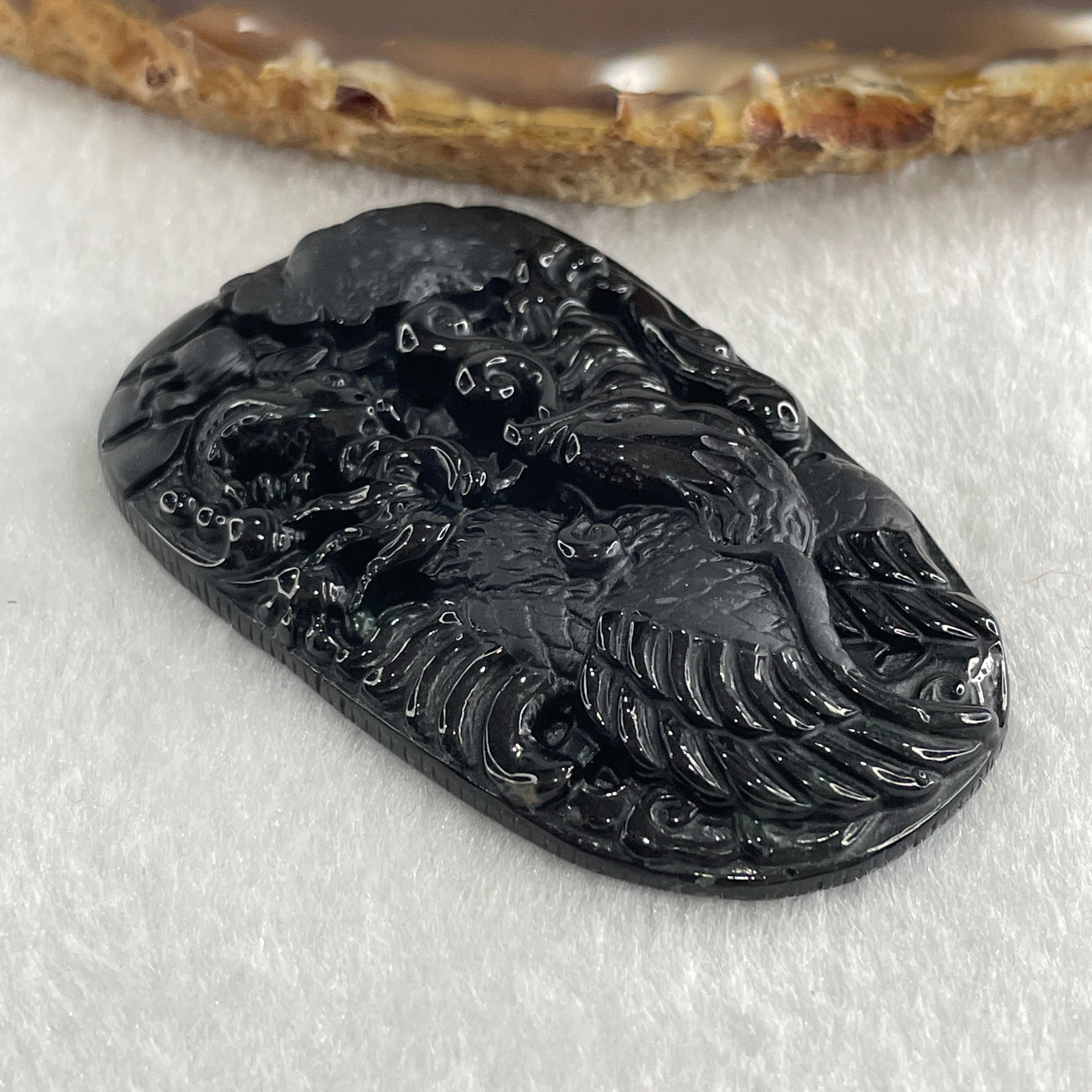 Type A Opaque to Partial Translucent Black Omphacite Jadeite Eagle Fish and Lotus Leaf Pendant 29.55g 60.1 by 38.1 by 8.0mm - Huangs Jadeite and Jewelry Pte Ltd
