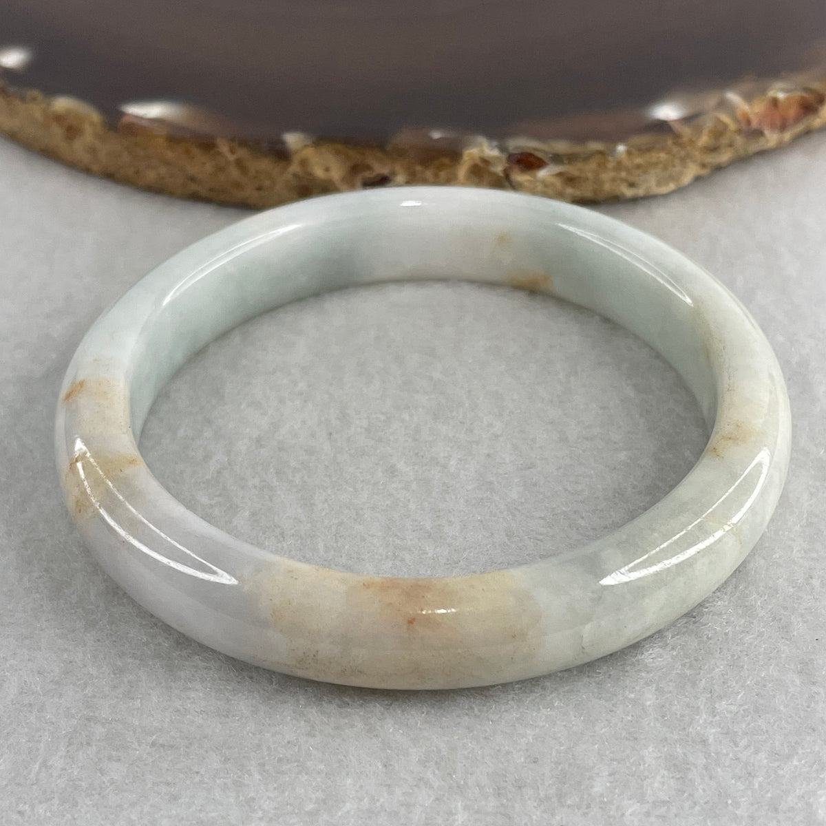 Natural Type A Light Lavender with Green and Brownish Piao Hua Jadeite Flat Ding Dang Bangle 39.14g Inner Diameter 54.5mm 10.2 by 7.2mm (Slight External Rough) - Huangs Jadeite and Jewelry Pte Ltd