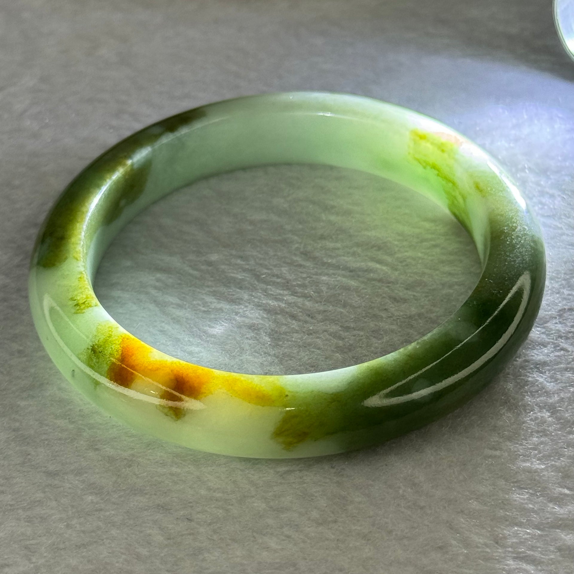 Type A Light Green and Moss Green and Brown Patches Jadeite Bangle 55.5mm 51.12g 10.6 by 9.0mm (Slight Internal Line) - Huangs Jadeite and Jewelry Pte Ltd