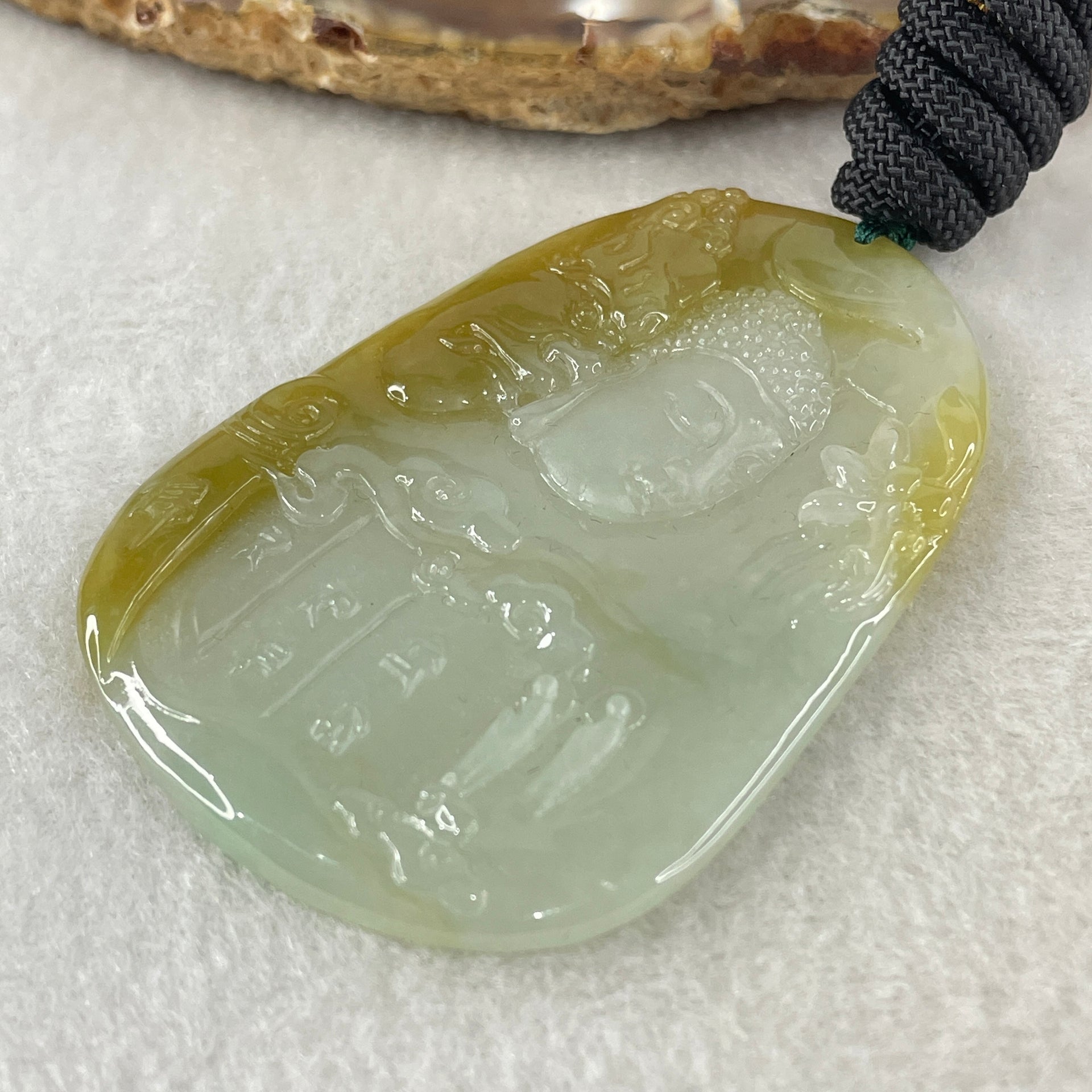 Grand Master Type A Faint Blueish Green with Yellowish Brown Jadeite Good Vs Evil Pendant 22.60g 60.3 by 43.3 by 4.0mm - Huangs Jadeite and Jewelry Pte Ltd