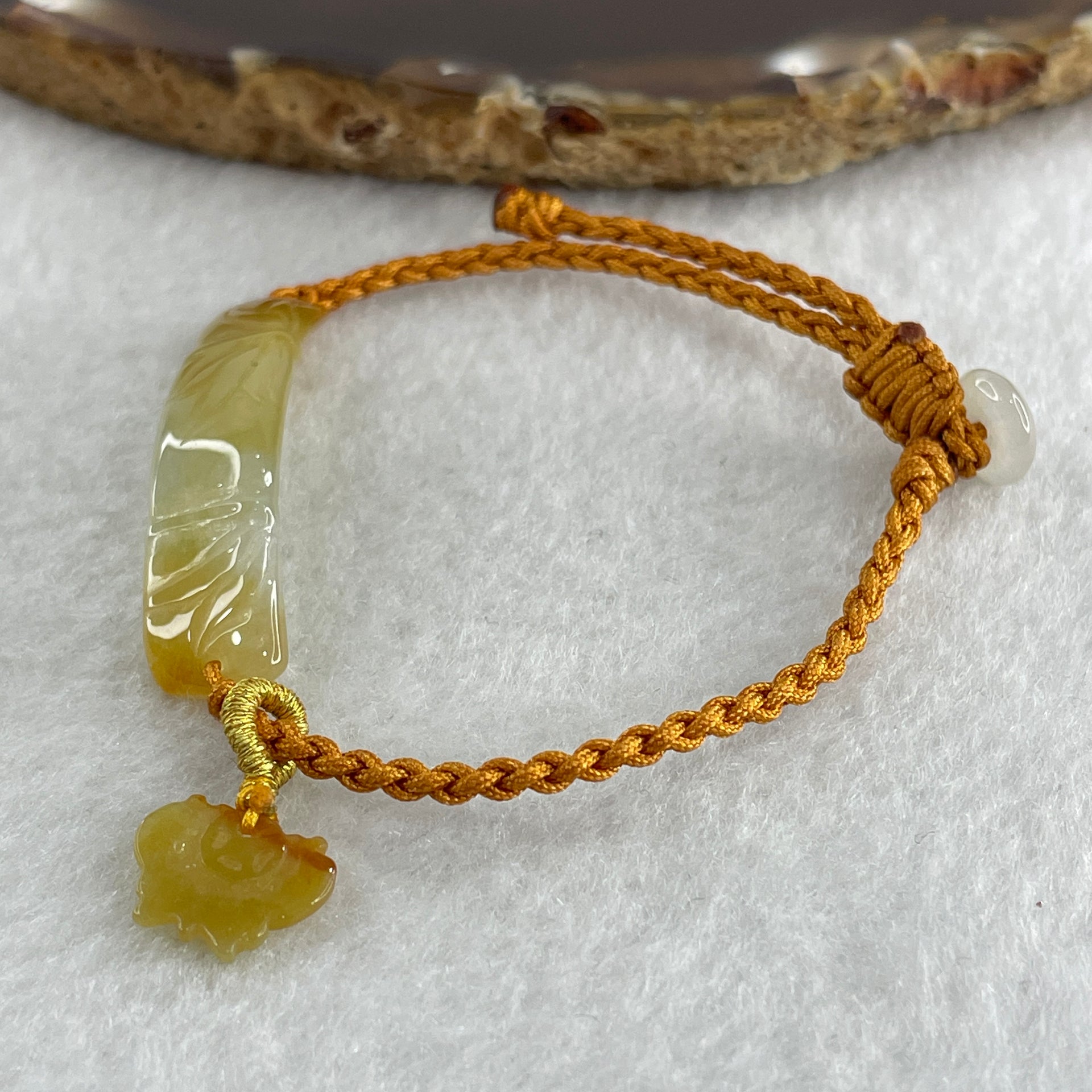 Natural Type A Yellowish with Light Green Jadeite Bamboo with Butterfly in String Bracelet 3.97g 14-16cm 39.1 by 9.1 by 2.9mm - Huangs Jadeite and Jewelry Pte Ltd