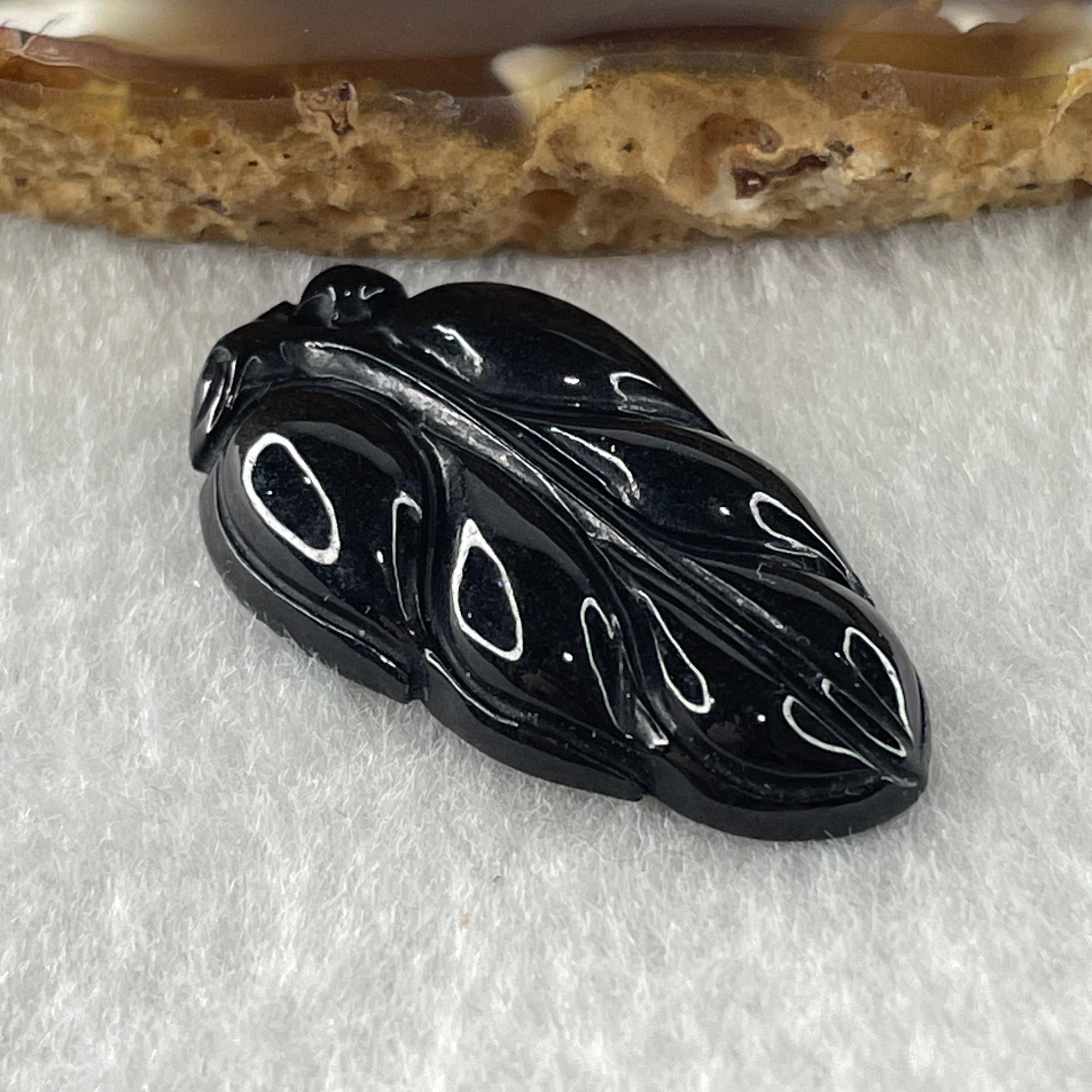 Type A Opaque Black Omphacite Leaf Pendant Charm 5.60g 31.5 by 18.0 by 5.7mm - Huangs Jadeite and Jewelry Pte Ltd