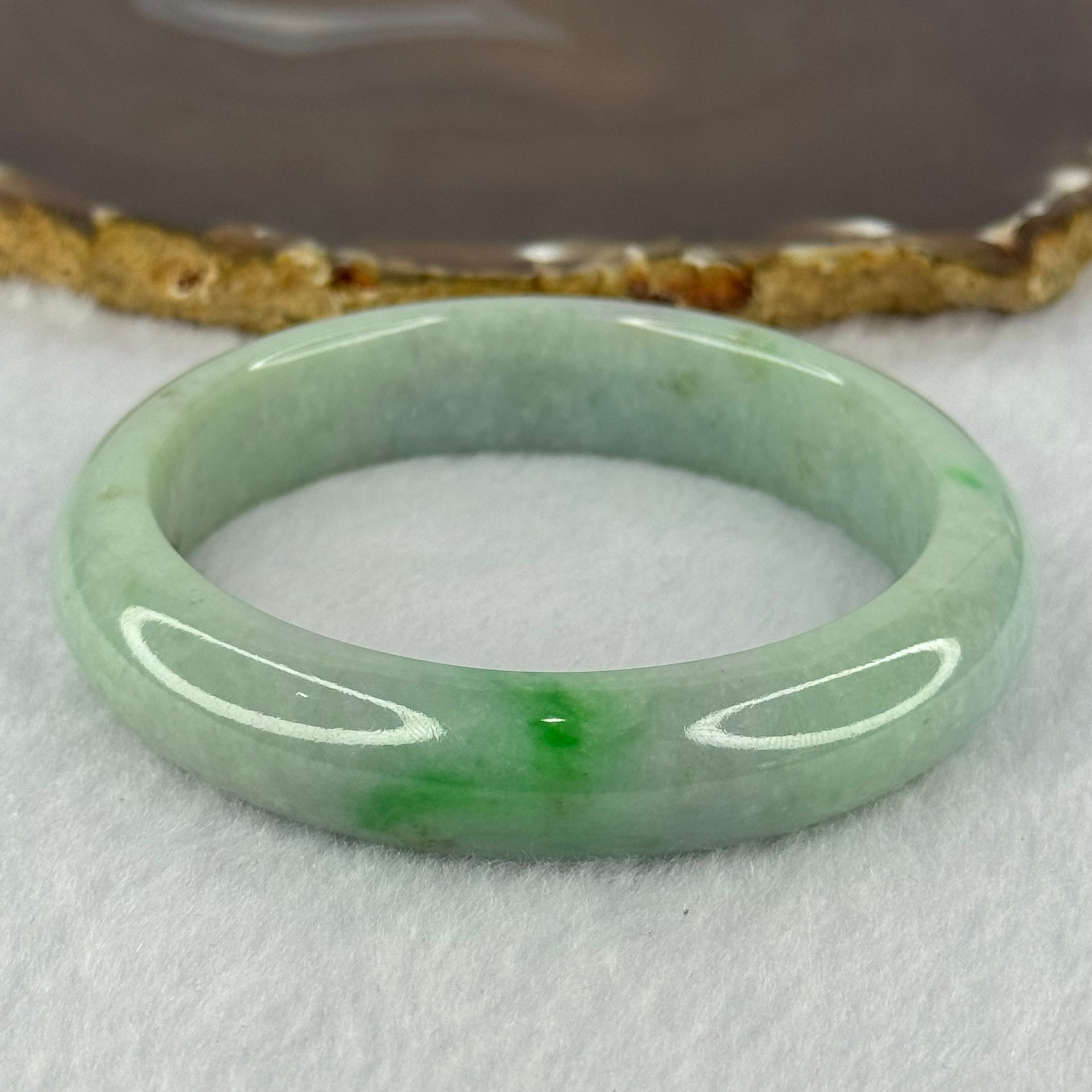 Type A Light Green with Bright Green Patches Jadeite Bangle 78.00g Internal Diameter 61.7mm 14.5 by 9.9mm (Very Slight External Rough) - Huangs Jadeite and Jewelry Pte Ltd