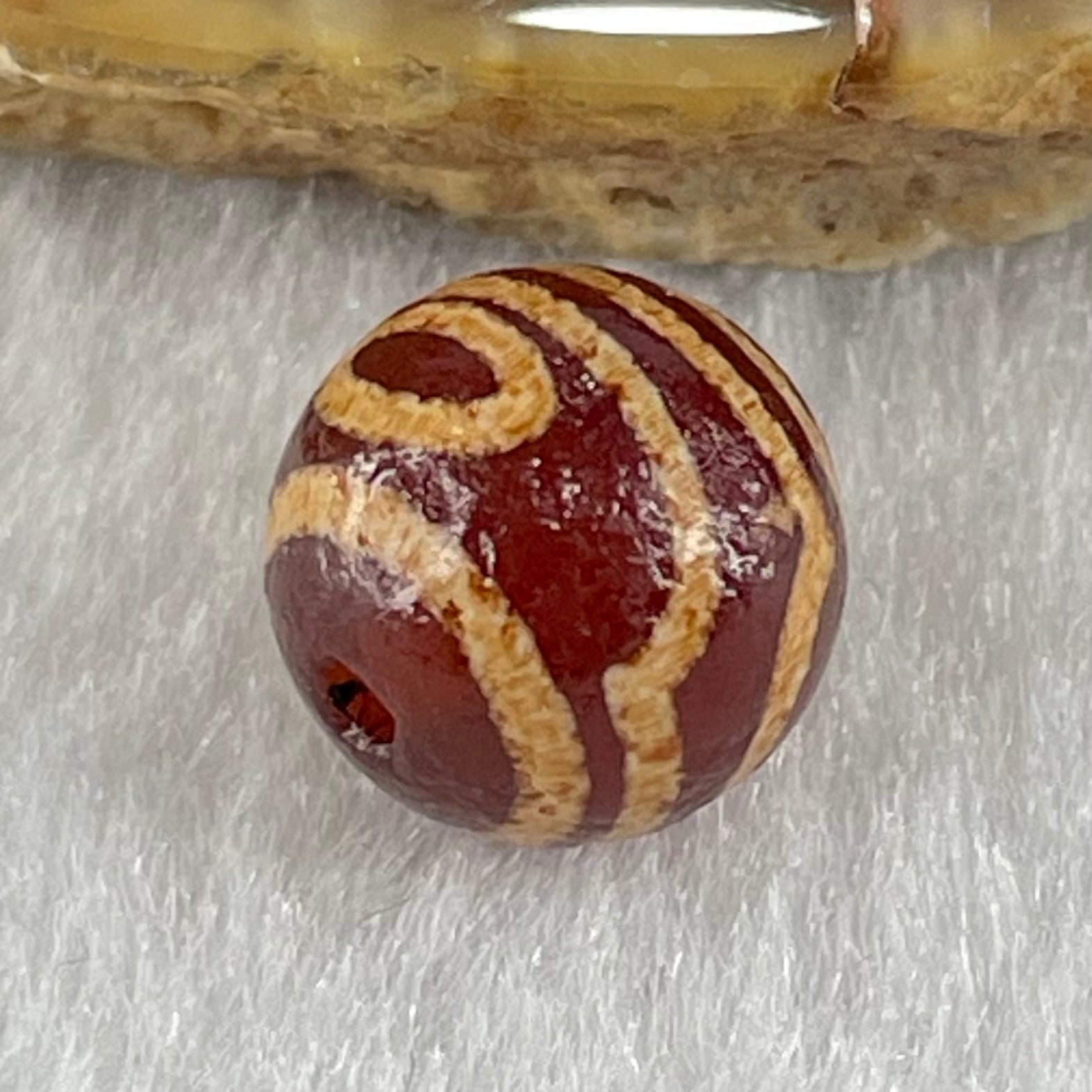 Natural Powerful Tibetan Old Oily Agate 2 Eye Dzi Bead Heavenly Master (Tian Zhu) 二眼天珠 1.42g 10.1 by 10.3mm - Huangs Jadeite and Jewelry Pte Ltd
