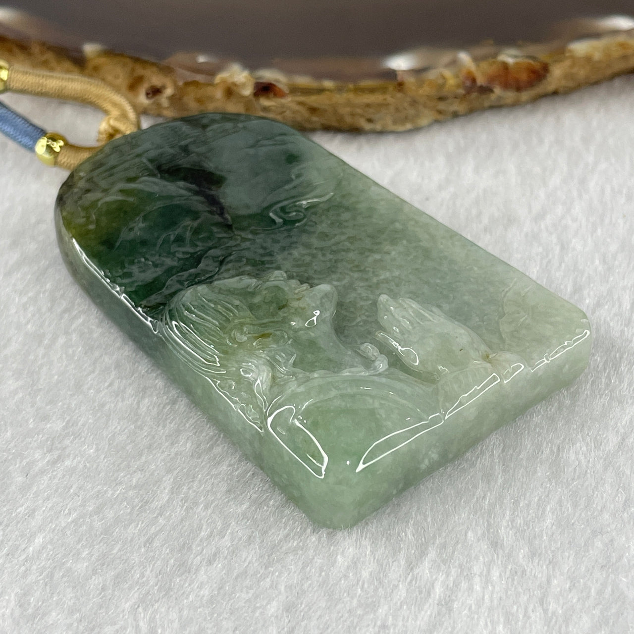 Natural Type A Light Green to Dark Green Jadeite People Seeking for Enlightenment Pendant 66.767g 64.1 by 39.0 by 11.0mm