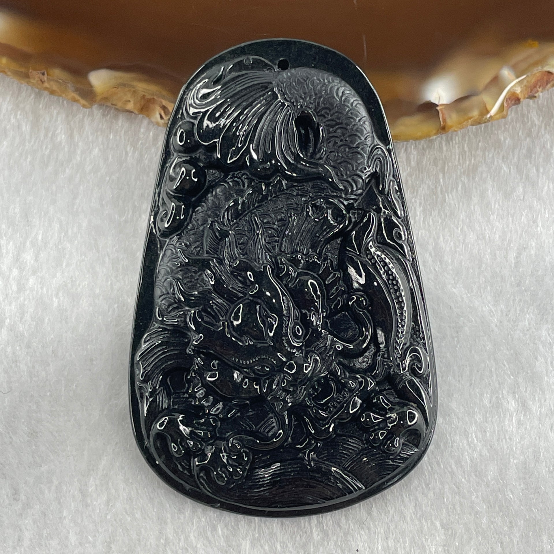 Type A Opaque to Partial Translucent Black Omphacite Jadeite Dragon Carp Pendant 20.39g 57.5 by 36.6 by 7.5mm - Huangs Jadeite and Jewelry Pte Ltd