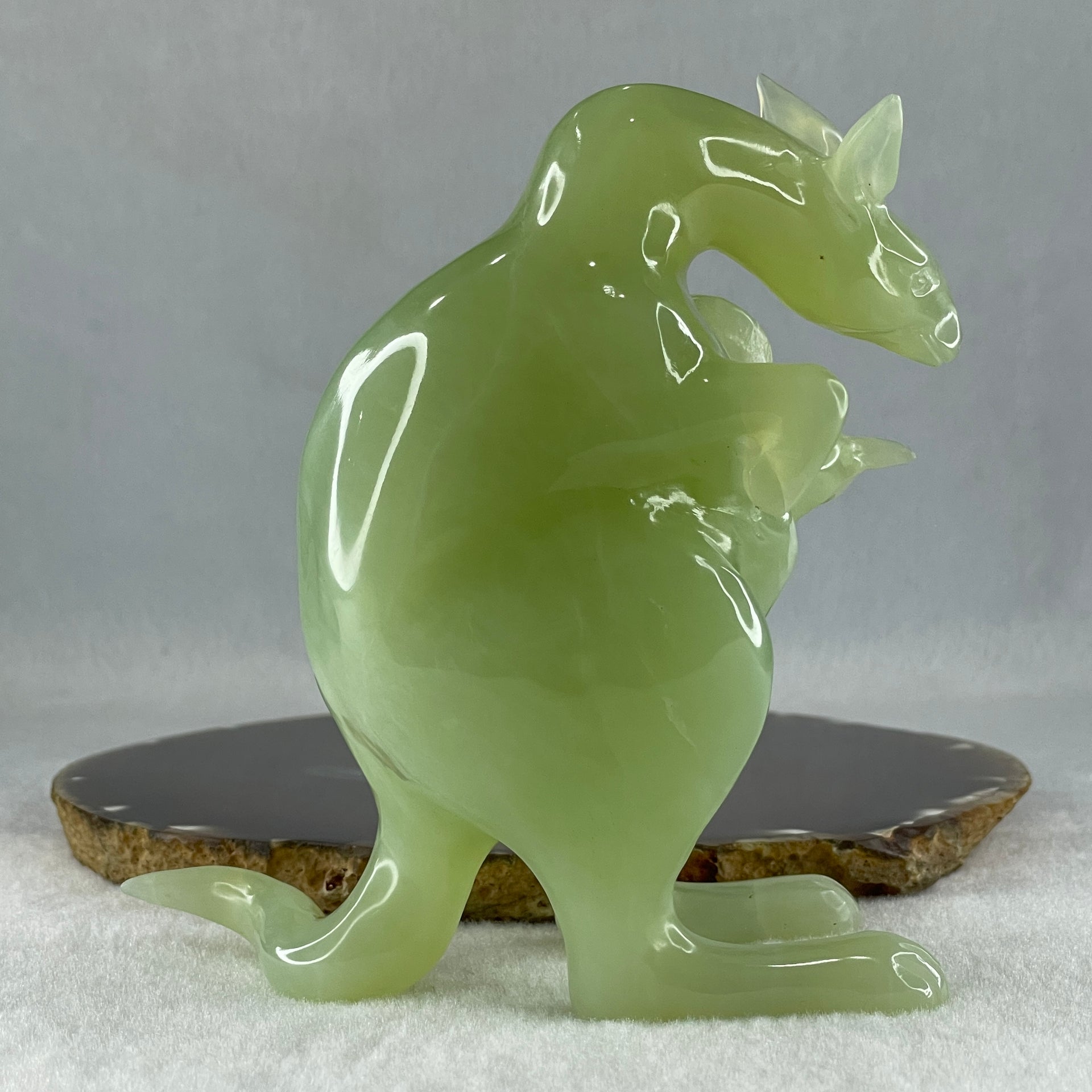 Natural Green Serpentine Kangaroo With Baby with Wooden Stand Display 569.6g 140.0 by 85.4 by 145.0mm - Huangs Jadeite and Jewelry Pte Ltd