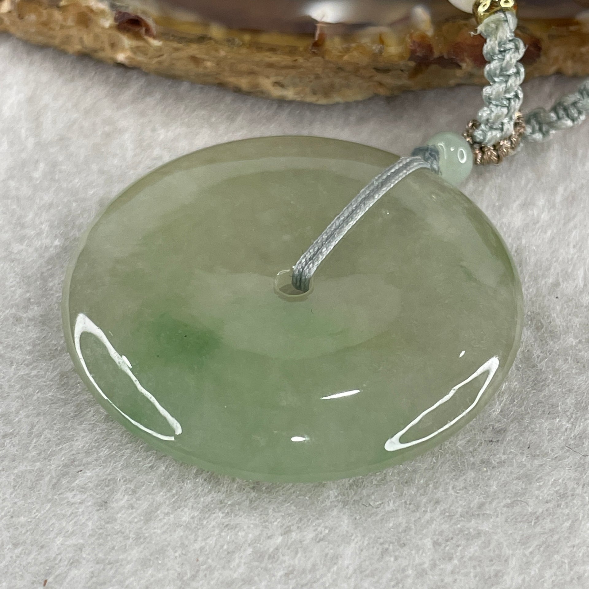 Grand Master Natural Semi Icy Light Green Jadeite Ping An Kou Pendant 20.36g 39.2 by 5.7mm - Huangs Jadeite and Jewelry Pte Ltd