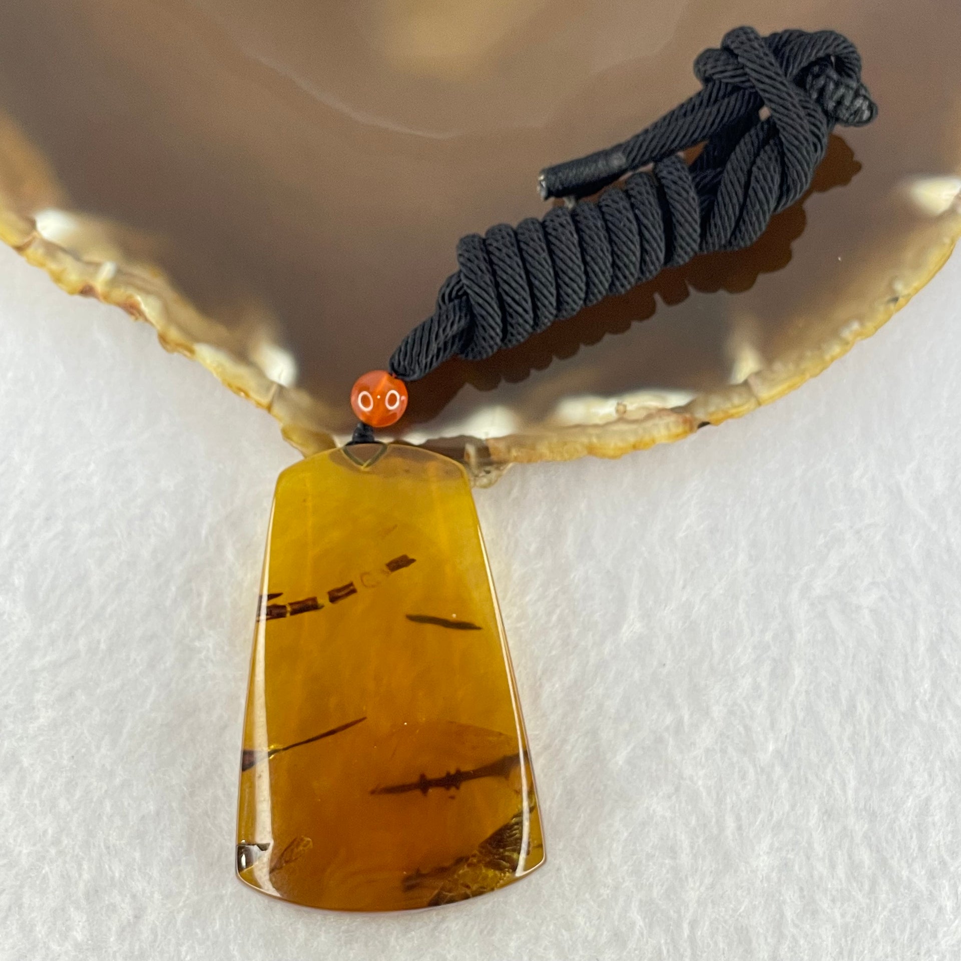 Natural Cognac Flora Amber Pendant 15.12g 52.3 by 34.2 by 12.2mm - Huangs Jadeite and Jewelry Pte Ltd