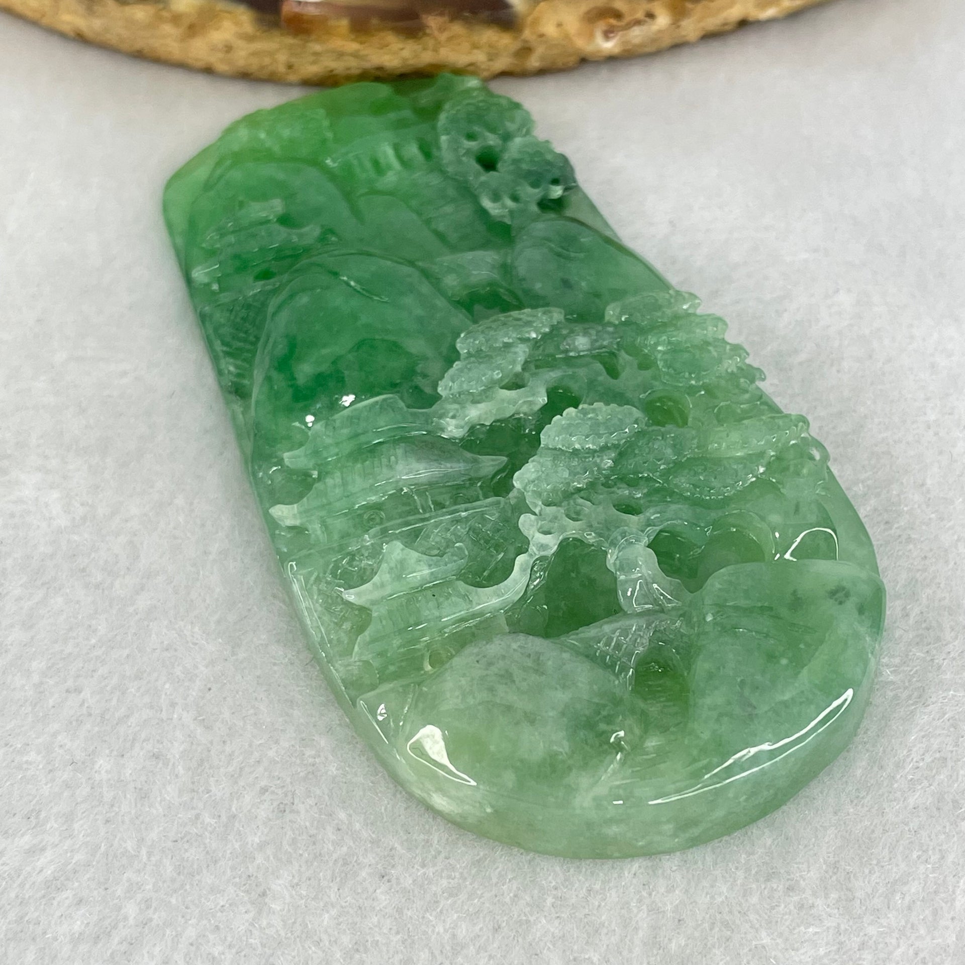 Type A Semi Icy Bright Green Jadeite Double Sided Shan Shui with Gui Ren Benefactor Pendant 47.64g 76.5 by 39.9 by 9.0mm - Huangs Jadeite and Jewelry Pte Ltd