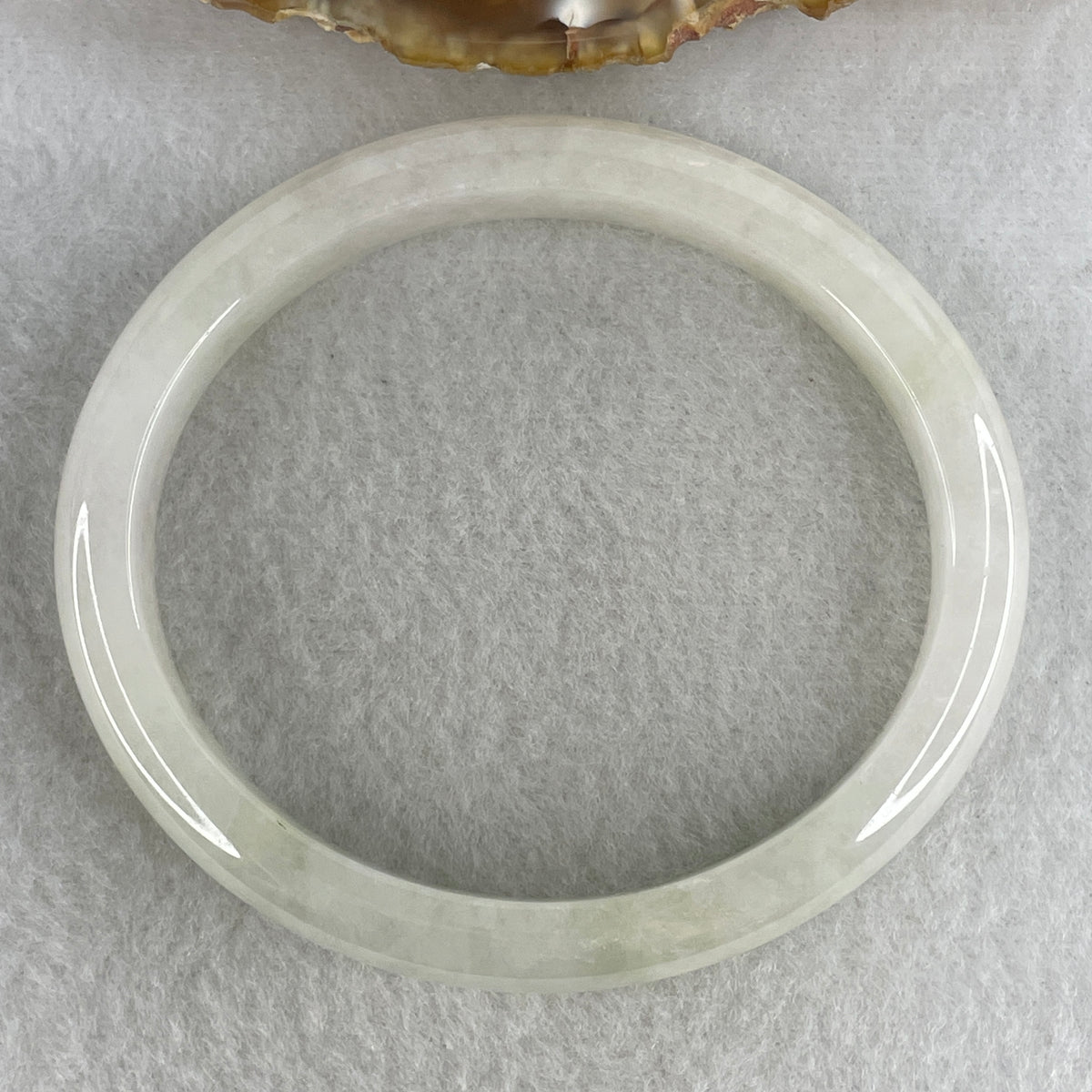 Certified Natural Type A Near White & Faint Green Jadeite Oval Bangle | 65.1mm Inner Diameter (48.42g 10.8x7.7mm | Internal Line, Slight External Rough | Pure Peace & Heart Harmony) - Huangs Jadeite and Jewelry Pte Ltd