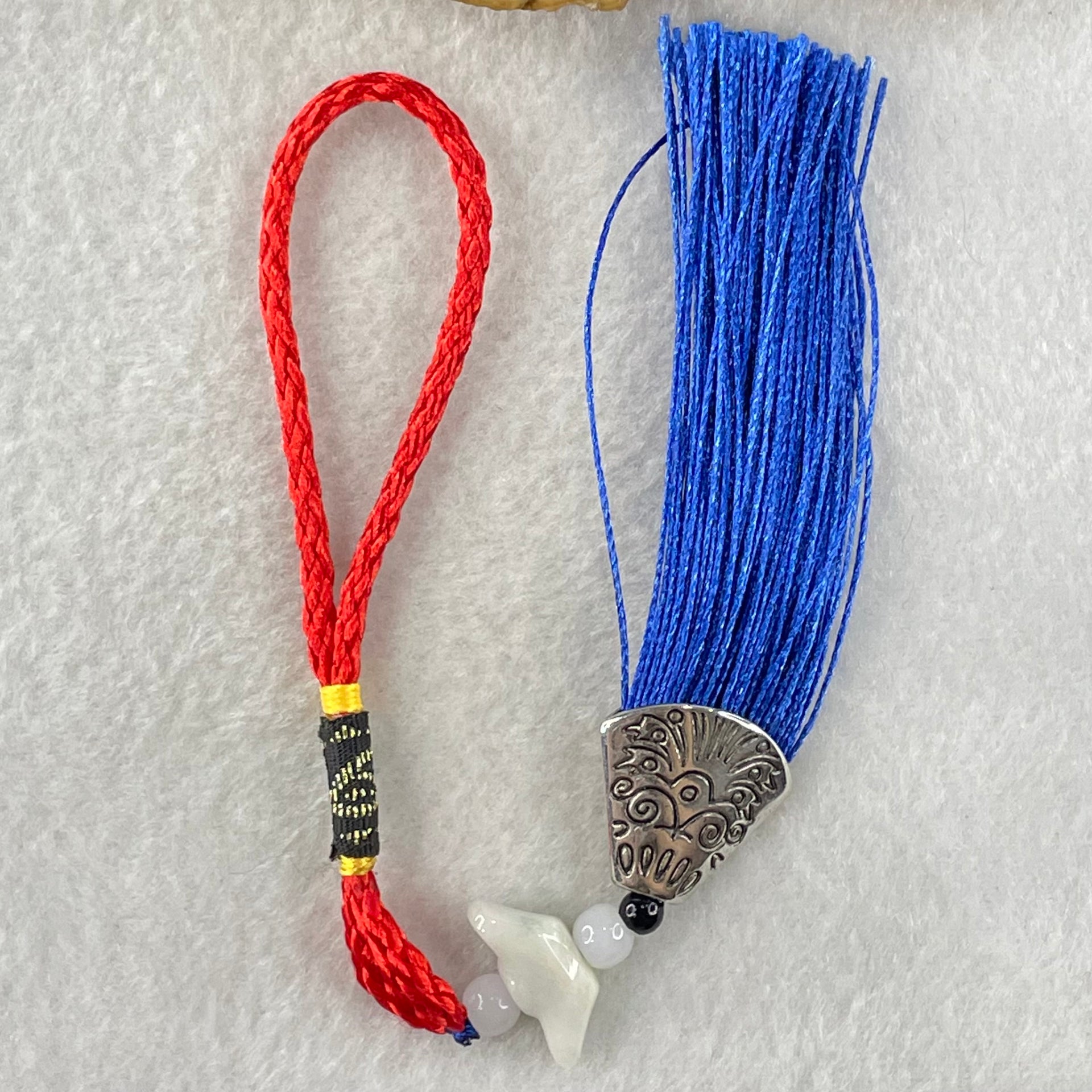 Type A Light Lavender Yellow Jadeite Yuan Bao Ingot in Red Blue String Display 4.75g 7.1 by 17.3 by 6.7mm - Huangs Jadeite and Jewelry Pte Ltd