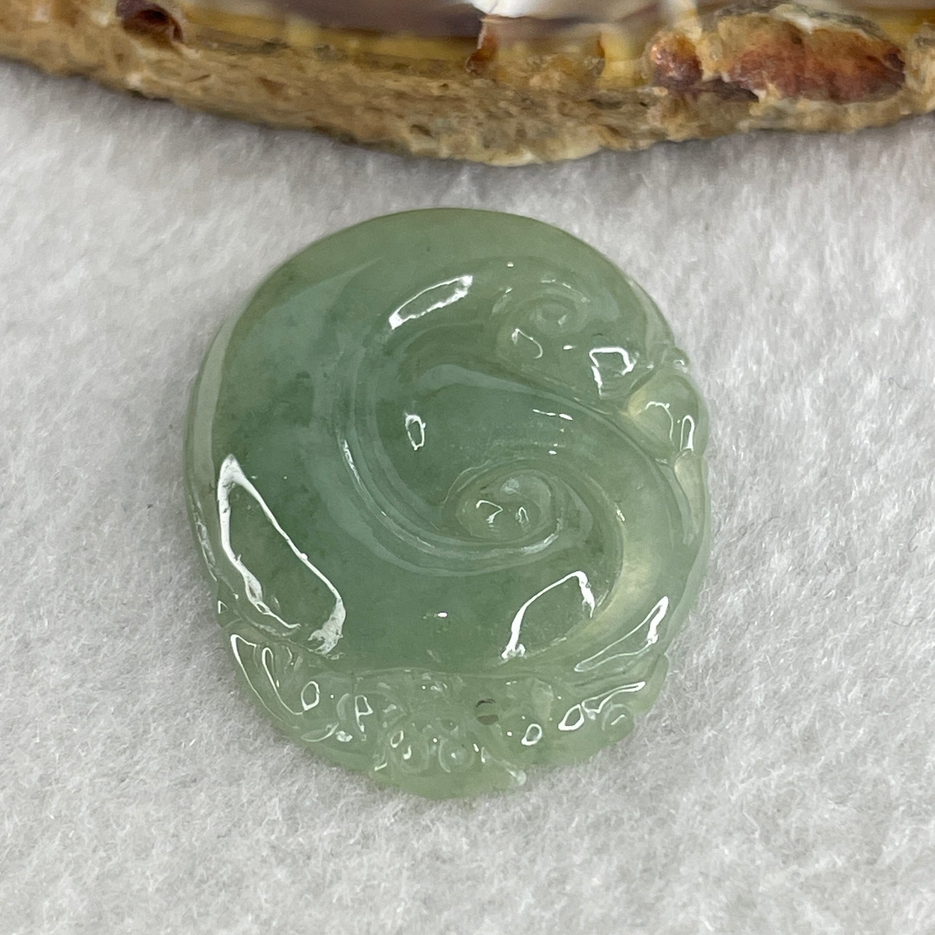 Natural Type A Semi Icy Green Jadeite Monkey on Ruyi Pendant 6.96g 37.6 by 25.5 by 4.4mm - Huangs Jadeite and Jewelry Pte Ltd
