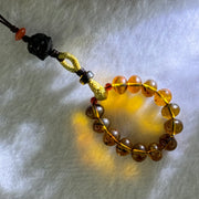 Natural Cognac Amber with Damo Head Handphone Strap 4.30g 7.6mm 13 Beads - Huangs Jadeite and Jewelry Pte Ltd