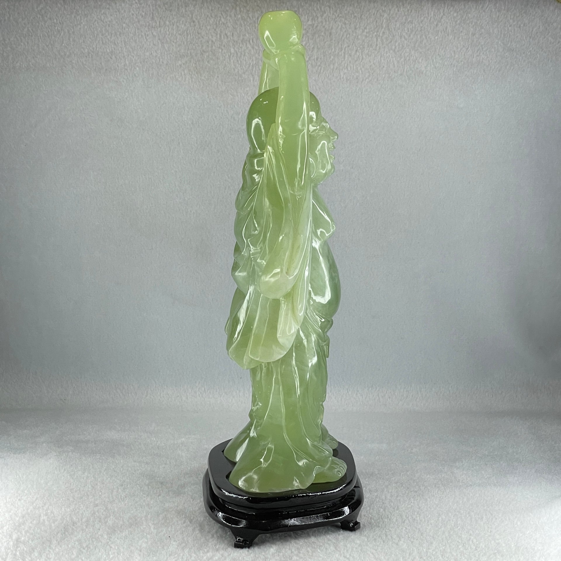 Natural Green Serpentine Stand Laughing Milo Buddha with Wealth Pot with Wooden Stand Display 1,599.3g 140.0 by 90.0 by 270.0mm - Huangs Jadeite and Jewelry Pte Ltd