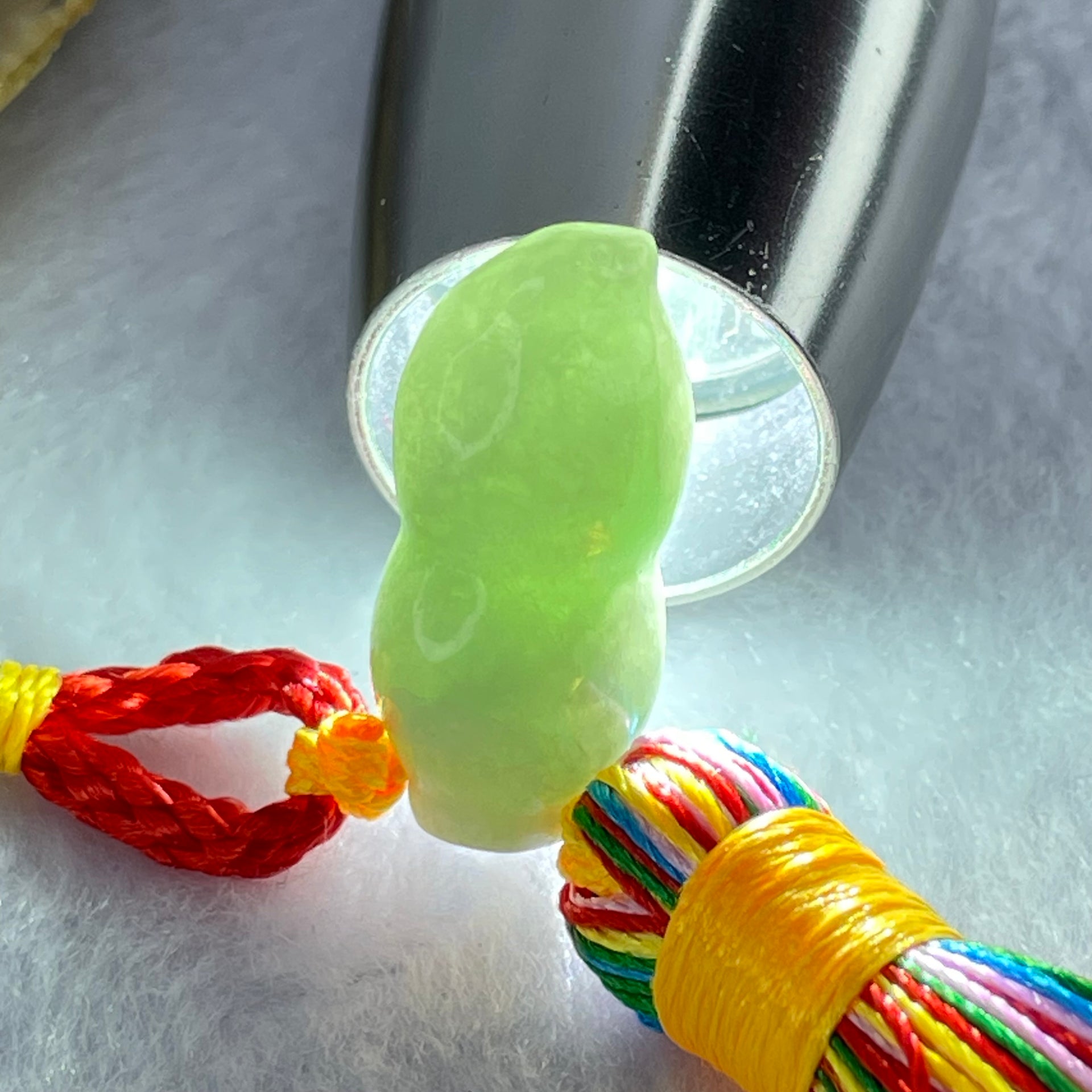 Type A Green Jadeite Peanut Charm Display 10.72g 24.4 by 11.5 by 11.3mm - Huangs Jadeite and Jewelry Pte Ltd