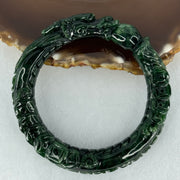 Type A Translucent to Opaque Old Mine Spicy Green Jadeite Dragon Bangle Internal Diameter 56.30mm 374.20cts 74.75g 16.0 by 12.5mm With NGI Cert 32885979 (Slight Internal Lines) - Huangs Jadeite and Jewelry Pte Ltd