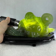 Natural Green Serpentine Siting Milo Buddha with Coin with Wooden Stand Display 1014.8g 200.0 by 100.0 by 105.0mm - Huangs Jadeite and Jewelry Pte Ltd