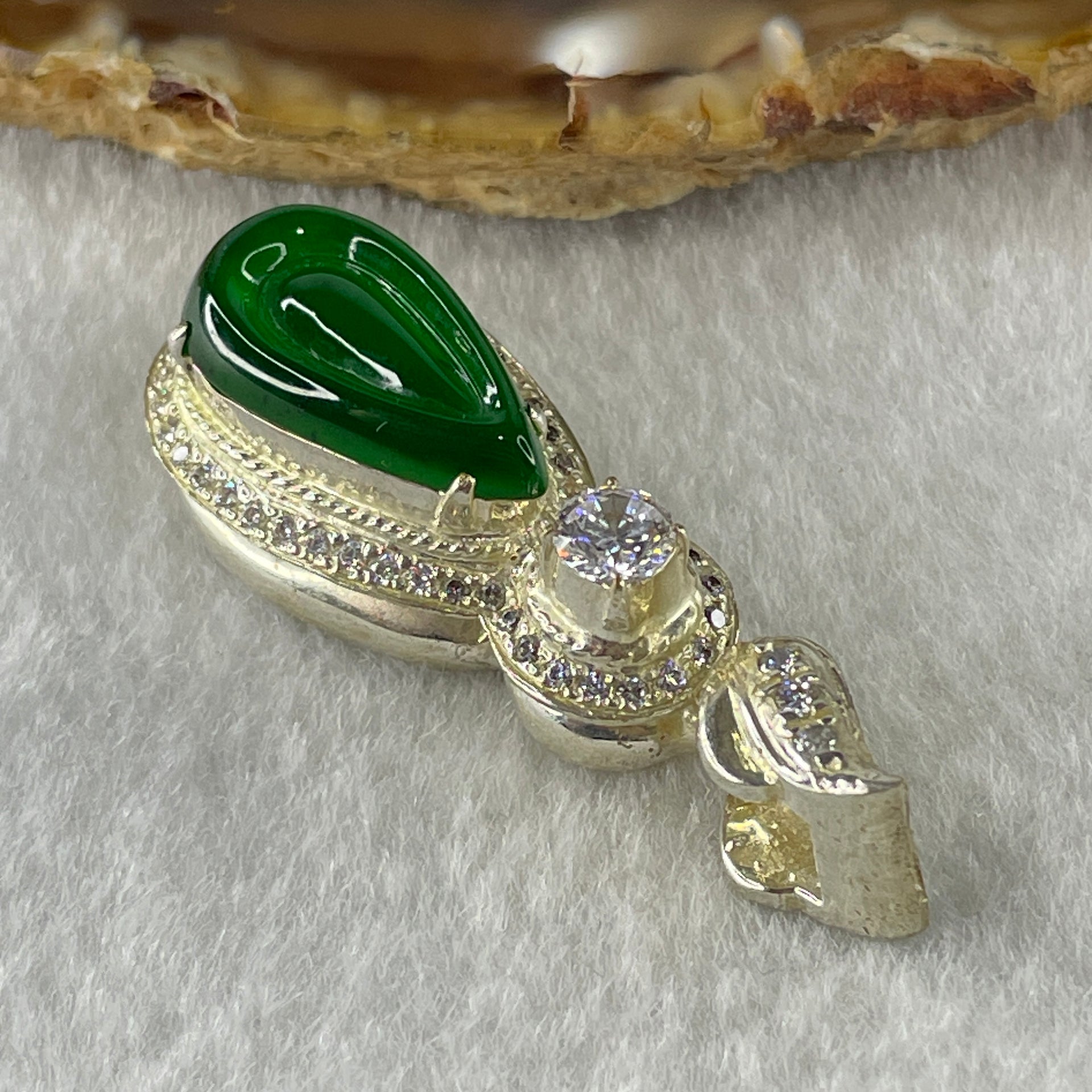 Type A Natural Semi Icy Bright Green Jadeite Tear Drop Shape Stone for Setting 18.1 by 10.5 by 3.0mm (On Silver Pendant Mold) 15.22g - Huangs Jadeite and Jewelry Pte Ltd