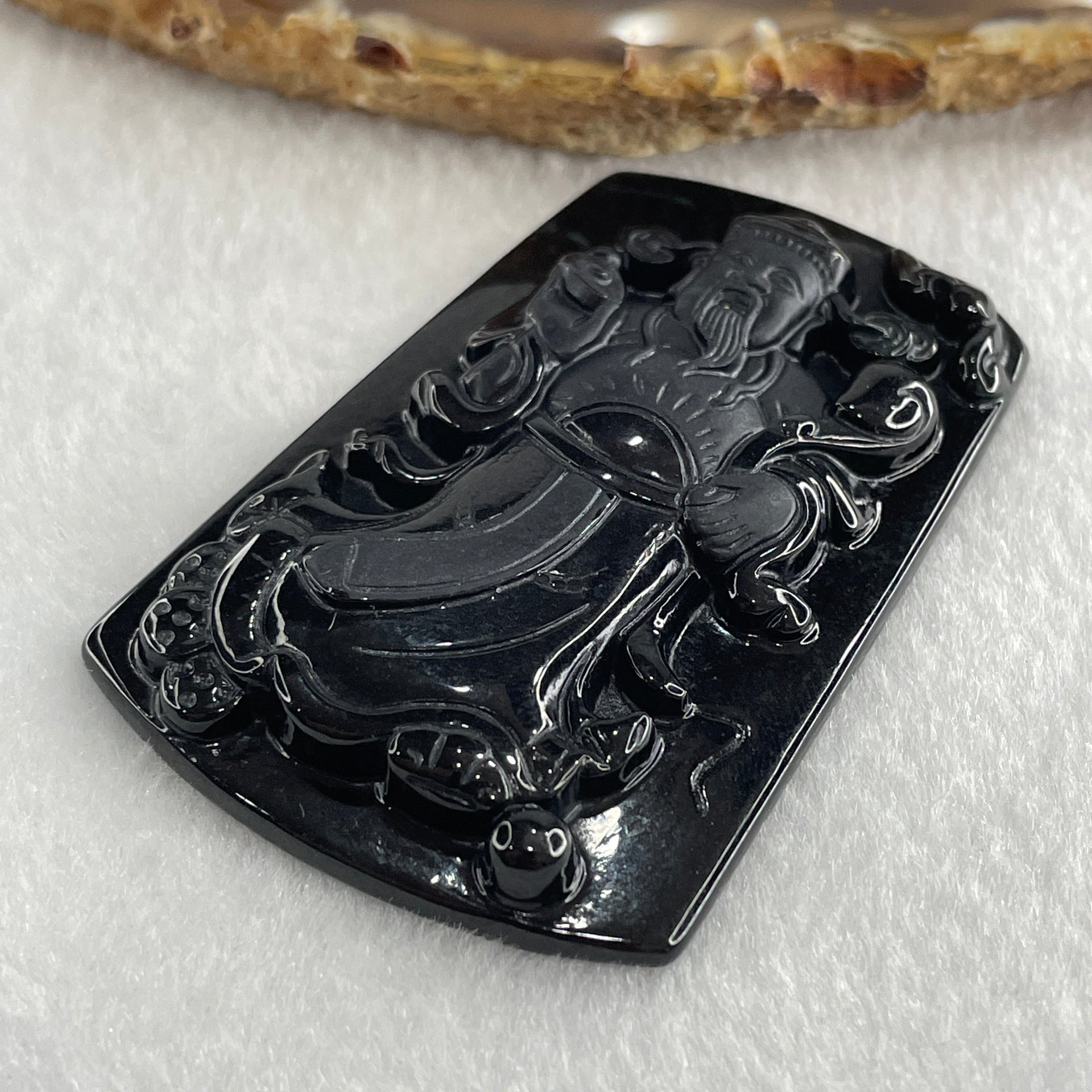 Type A Opaque to Partial Translucent Black Omphacite Jadeite Cai Shen Ye God of Fortune Pendant 26.80g 62.8 by 40.0 by 7.5mm - Huangs Jadeite and Jewelry Pte Ltd