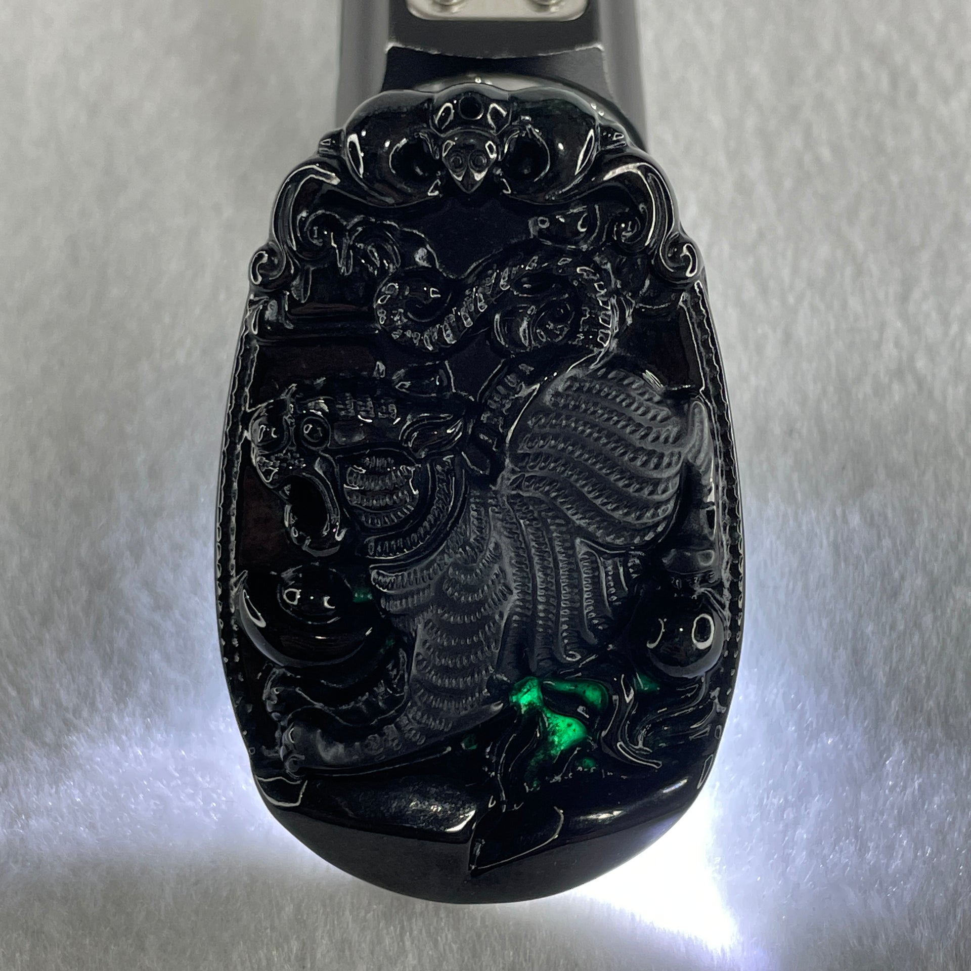 Type A Opaque to Partial Translucent Black Omphacite Jadeite Downhill Tiger Pendant 28.98g 60.9 by 39.8 by 9.0mm - Huangs Jadeite and Jewelry Pte Ltd
