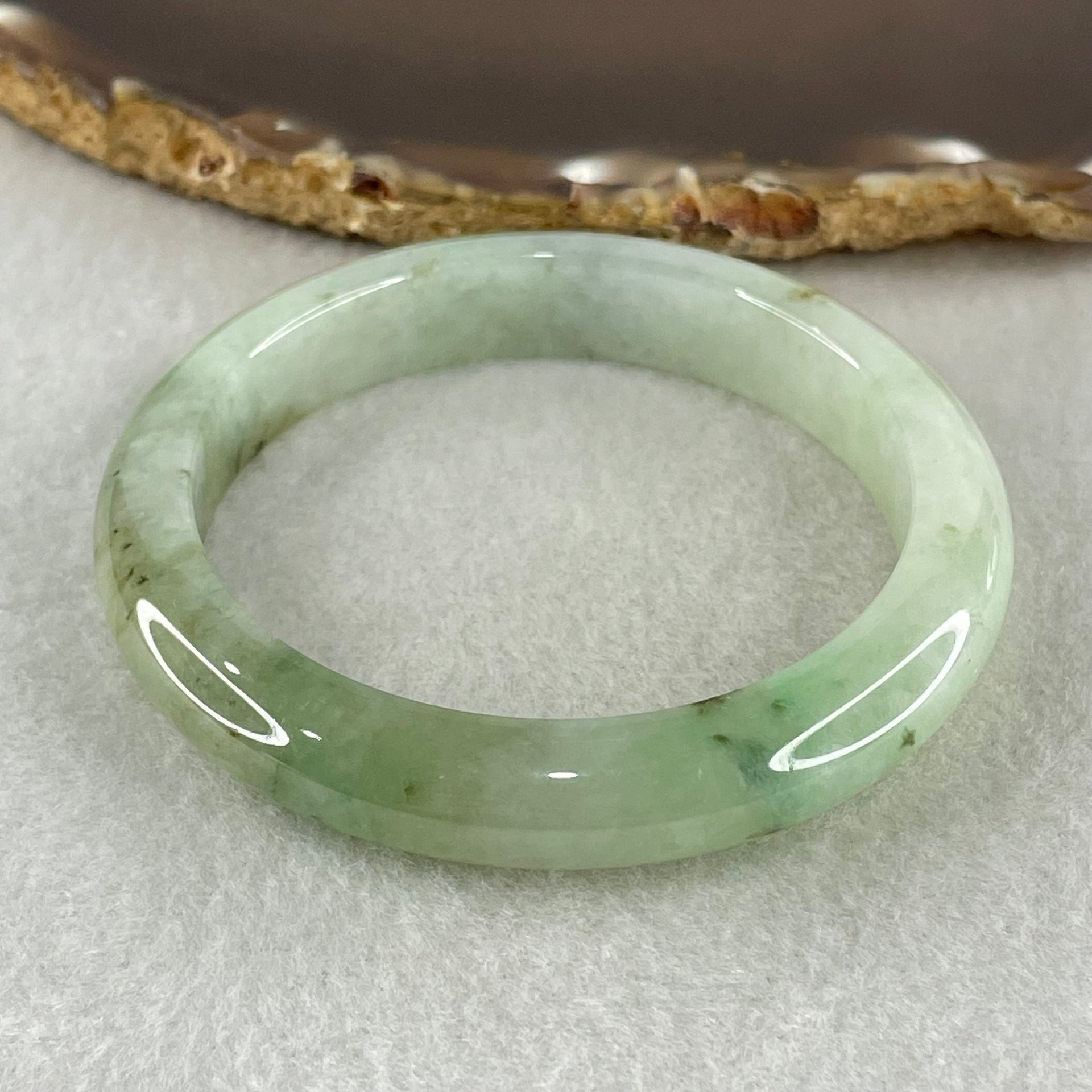 Type A Light Green with Green Patches Jadeite Bangle 43.14g Inner Diameter 53.2mm 10.6 by 8.0mm (Slight Internal Lines) - Huangs Jadeite and Jewelry Pte Ltd