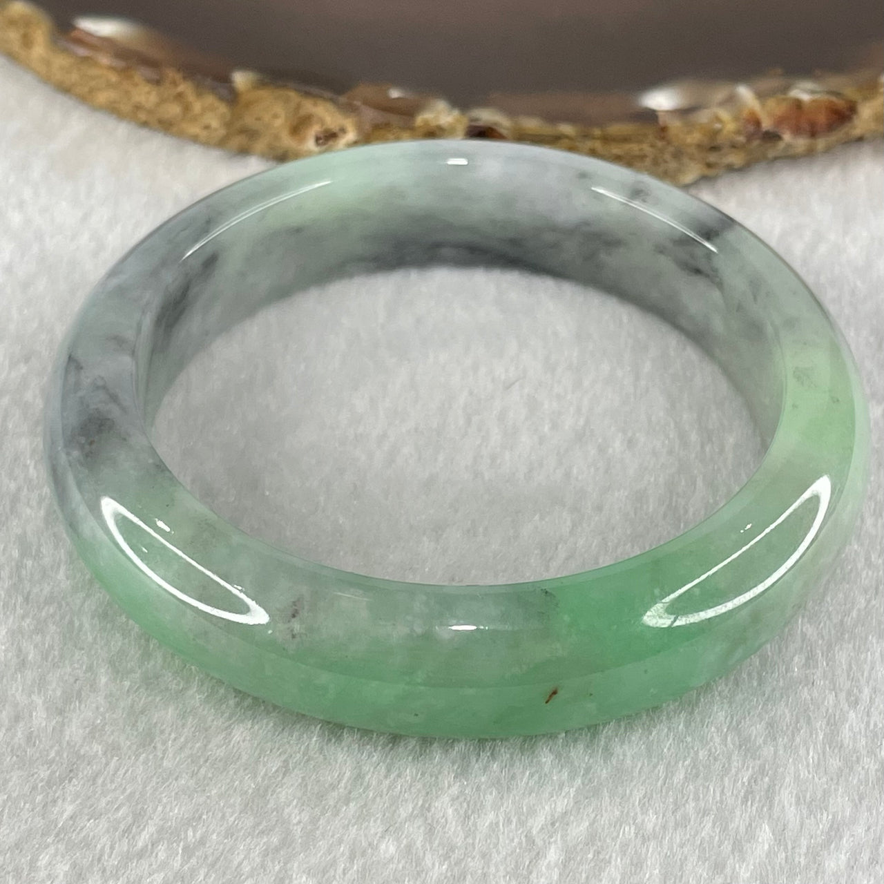 Type A Bright Green with Wuji Grey Black Patches Jadeite Bangle 58.90g Internal Diameter 54.7mm 13.3 by 8.5mm (Fine Internal Lines) - Huangs Jadeite and Jewelry Pte Ltd