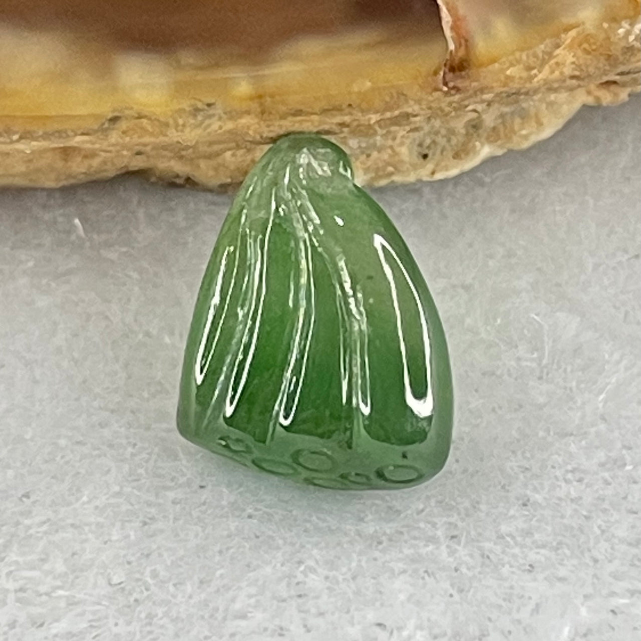 Type A Semi Icy Full Green Jadeite Lotus Flower Charm Stone For Setting 0.57g 10.8 by 8.7 by 3.7mm - Huangs Jadeite and Jewelry Pte Ltd