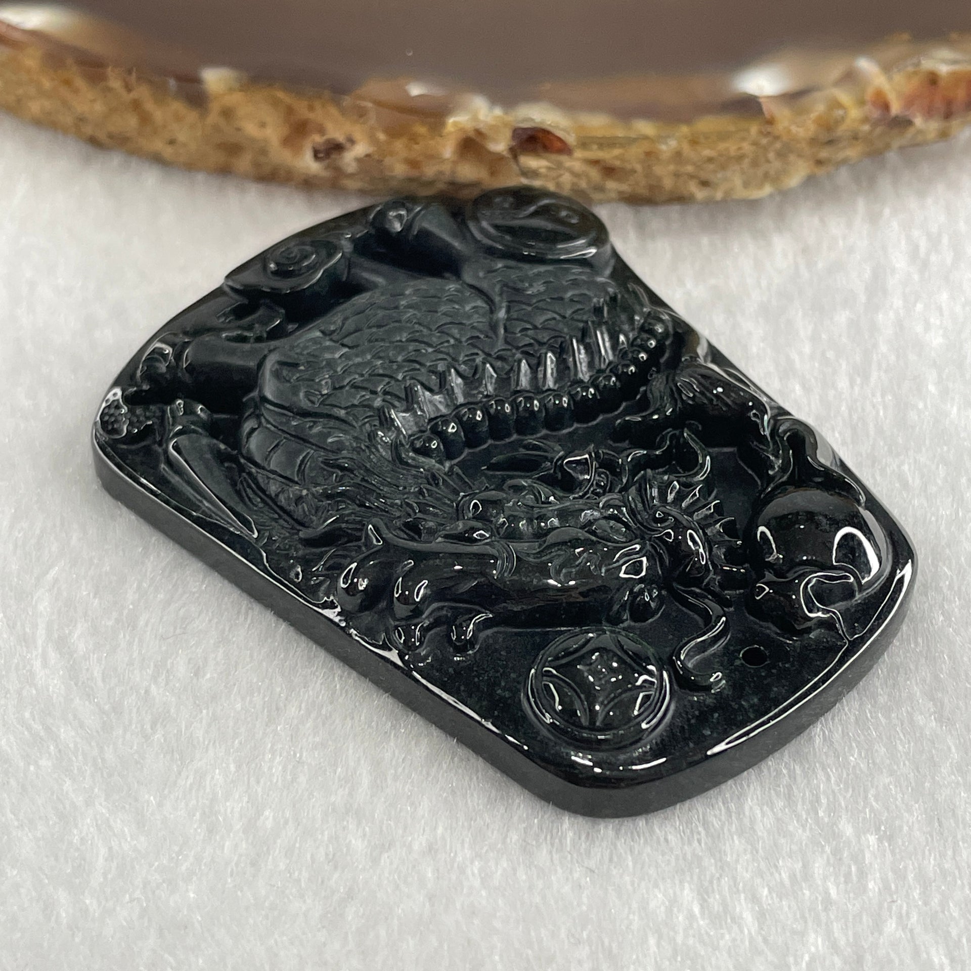 Type A Opaque to Partial Translucent Black Omphacite Jadeite Kirin Qilin Pendant 30.64g 55.7 by 43.5 by 8.5mm - Huangs Jadeite and Jewelry Pte Ltd