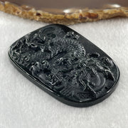 Type A Opaque to Partial Translucent Black Omphacite Jadeite Dragon Pendant 34.19g 66.8 by 45.5 by 9.4mm - Huangs Jadeite and Jewelry Pte Ltd