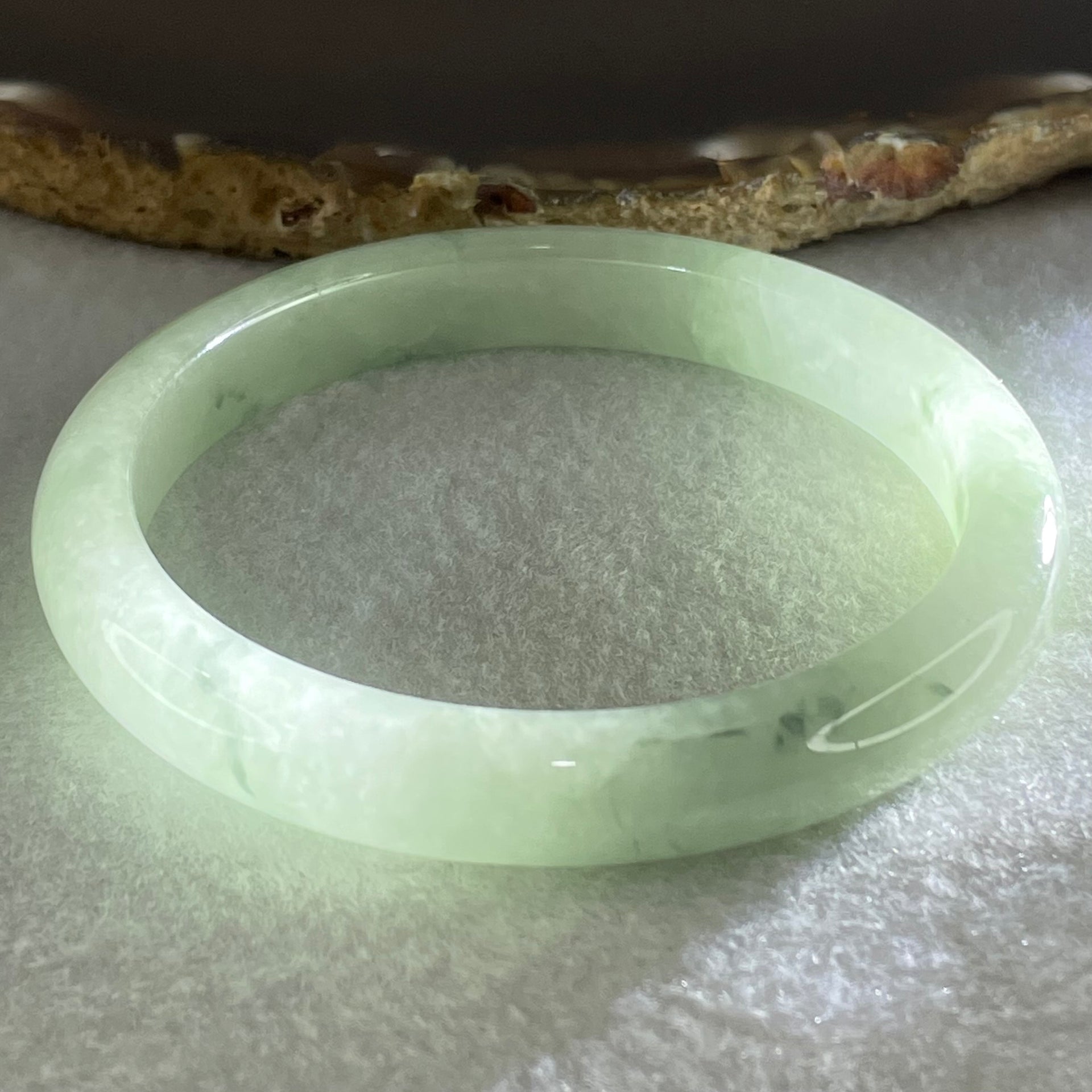 Type A Jelly Light Green with Blueish Green Piao Hua Floral Jadeite Bangle 38.24g Inner Diameter 55.8mm 9.4 by 7.2mm (Slight Internal Lines) - Huangs Jadeite and Jewelry Pte Ltd
