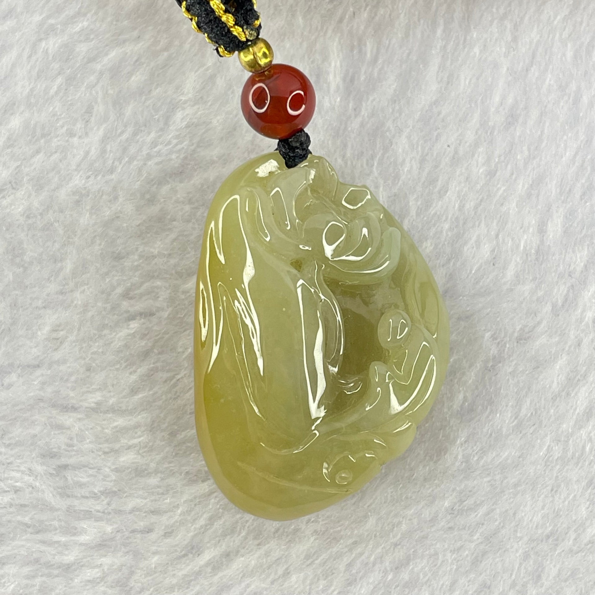 Type A Yellow with Green Jadeite Flower and Gui Ren Benefactor Pendant 18.03g 31.9 by 22.7 by 13.8mm - Huangs Jadeite and Jewelry Pte Ltd