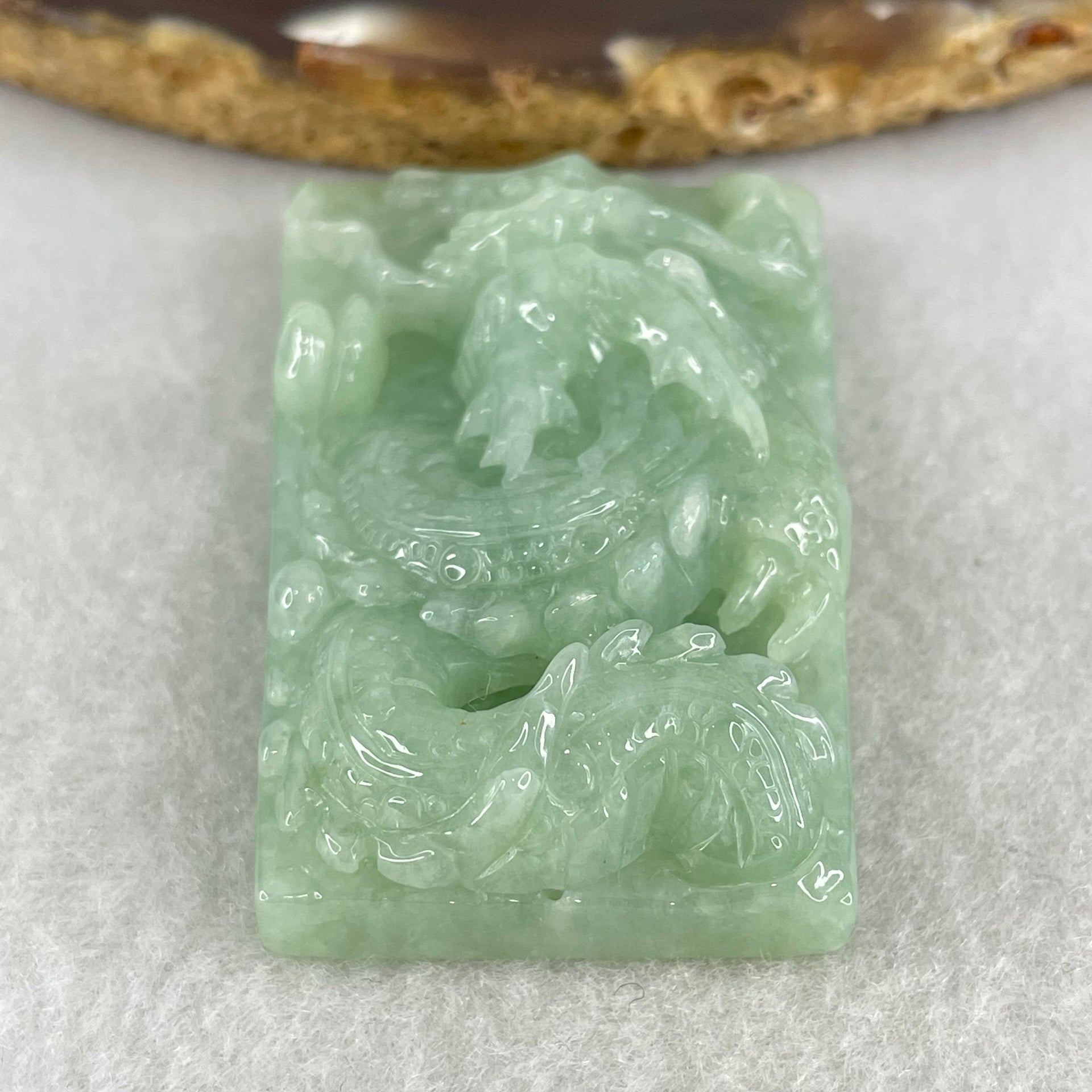 Type A Light Green Jadeite Dragon Pendant 43.35g 50.7 by 32.4 by 13.8mm - Huangs Jadeite and Jewelry Pte Ltd