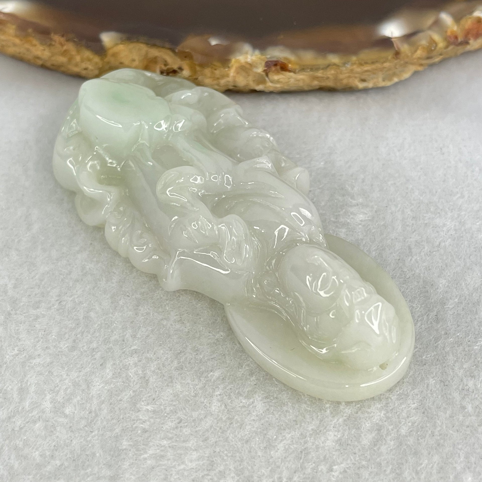 Type A Faint Green Lavender Jadeite Guan Yin Pendant 37.10g 61.8 by 28.3 by 14.3mm - Huangs Jadeite and Jewelry Pte Ltd