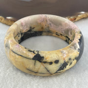 Entry Grade Natural Yellow with Black Rhodonite Bangle 105.93g Inner Diameter 55.2mm 25.5 by 11.7mm - Huangs Jadeite and Jewelry Pte Ltd