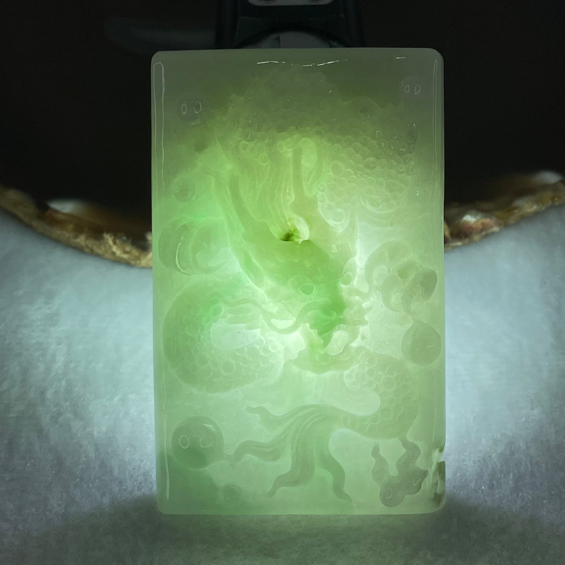 Type A Light Apple Green Jadeite Dragon Pendant 87.90g 69.4 by 44.2 by 14.2mm - Huangs Jadeite and Jewelry Pte Ltd